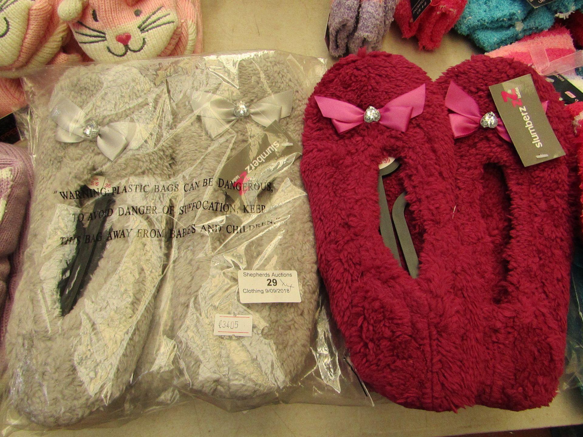 4 X Slumberz Ladies slippers 3 are size 7-8 the other is size 5-6 all new in packaging