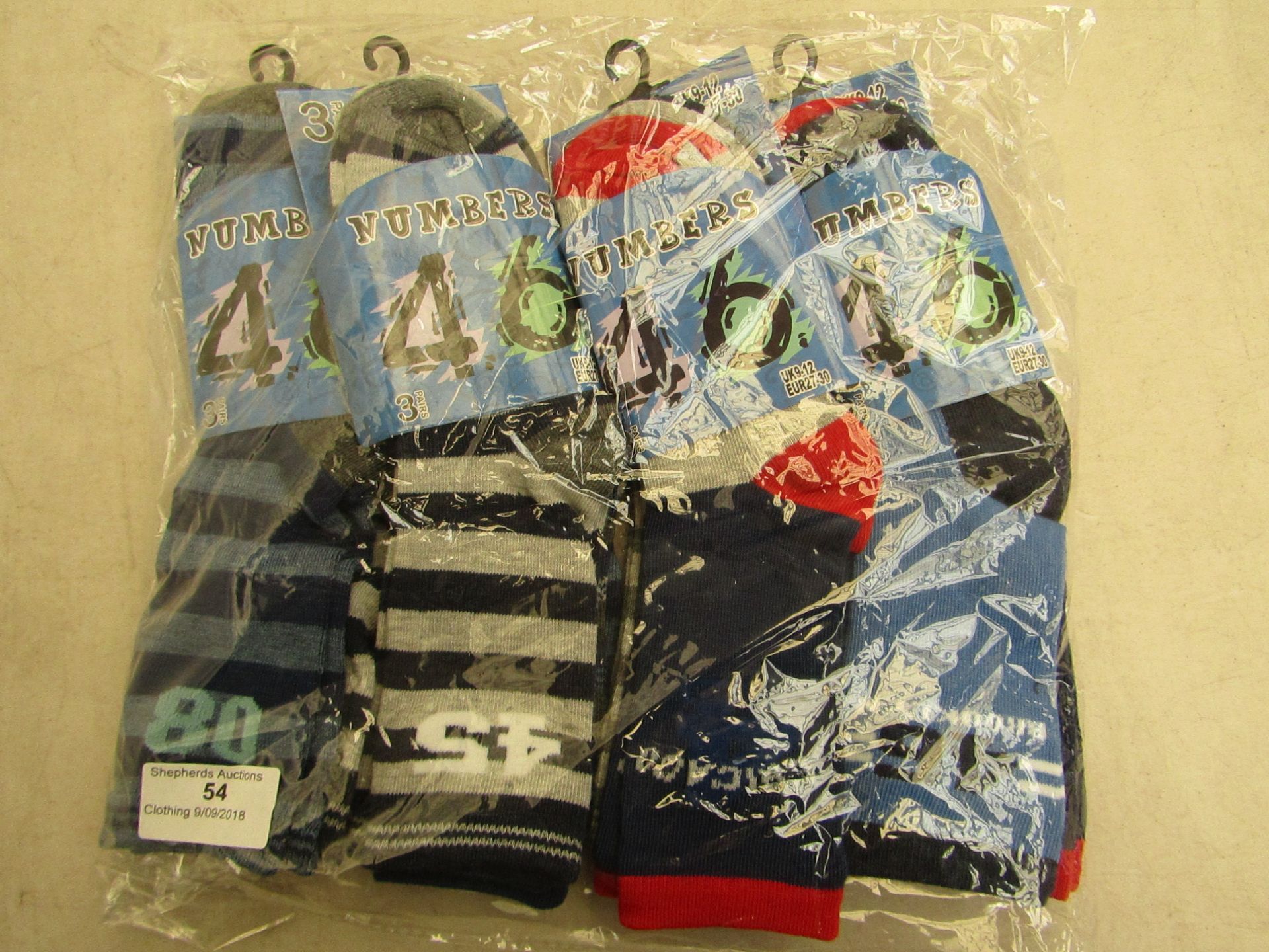 12 X Pairs of childrens socks numbers themed size 9-12 all new in packaging