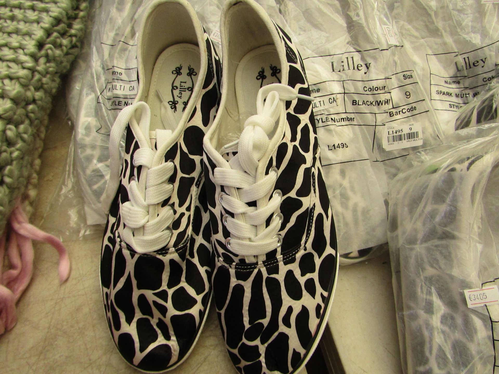 3 X Pairs of Animal Print Canvas shoes all size 9 all new & packaged