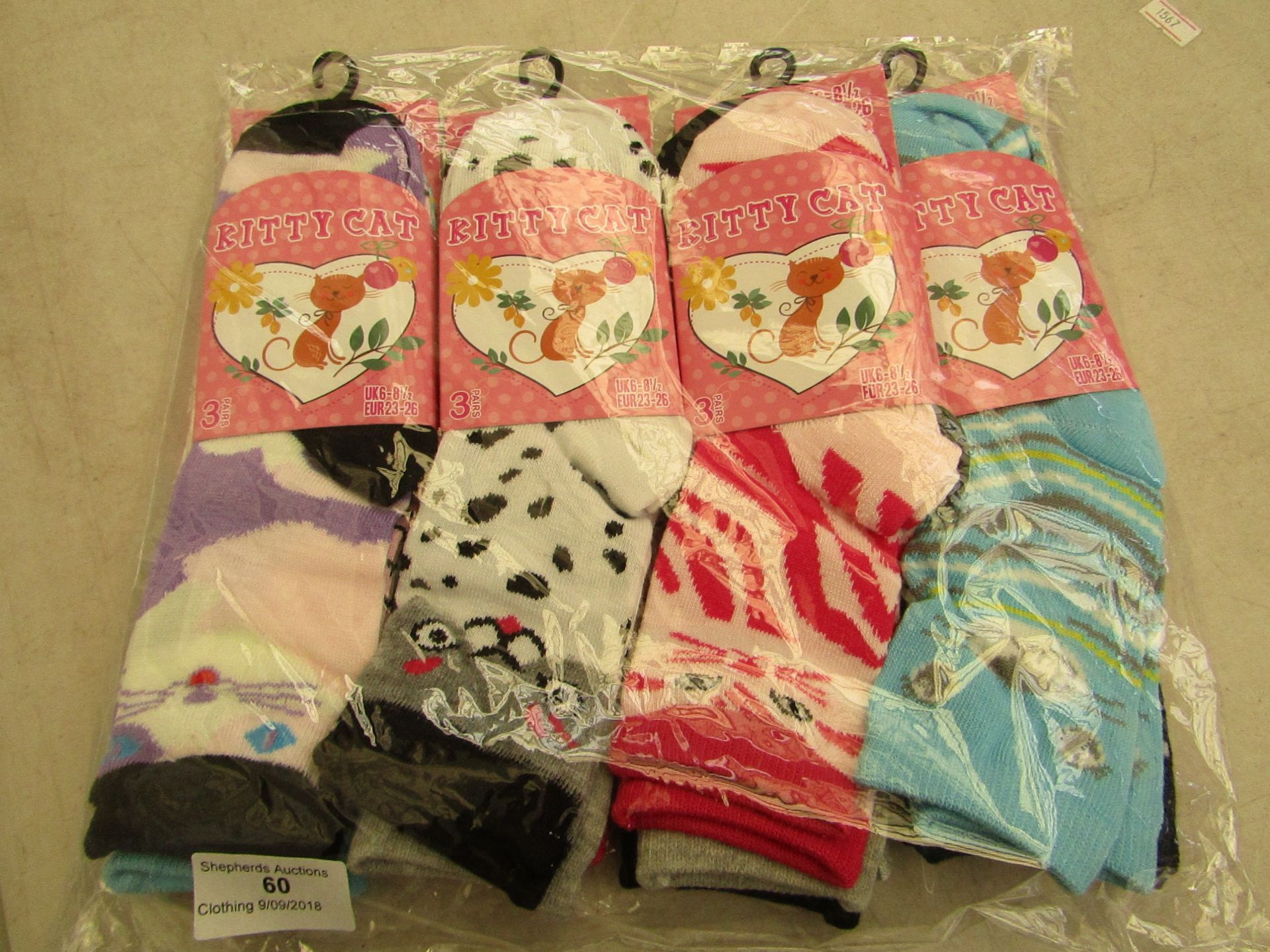 12 X Pairs of childrens socks kitty cat themed size 6-8 1/2 all new in packaging