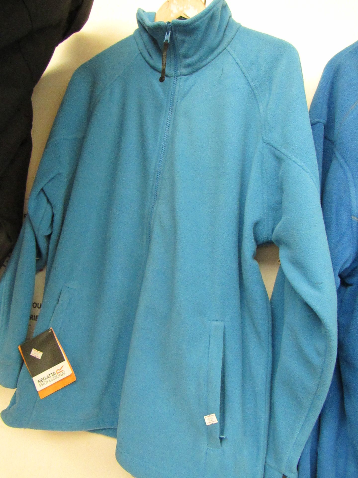 Regatta Fleece Blue ( full front zip with zipped pockets ) size L new in packaging