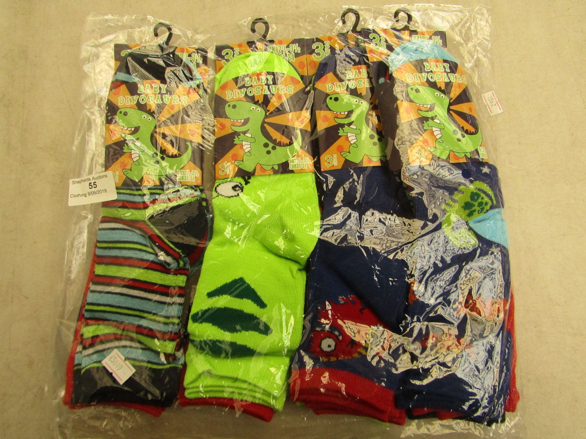 12 X Pairs of childrens socks baby dinosaurs themed size 12 1/2 -3 1/2 all new in packaging