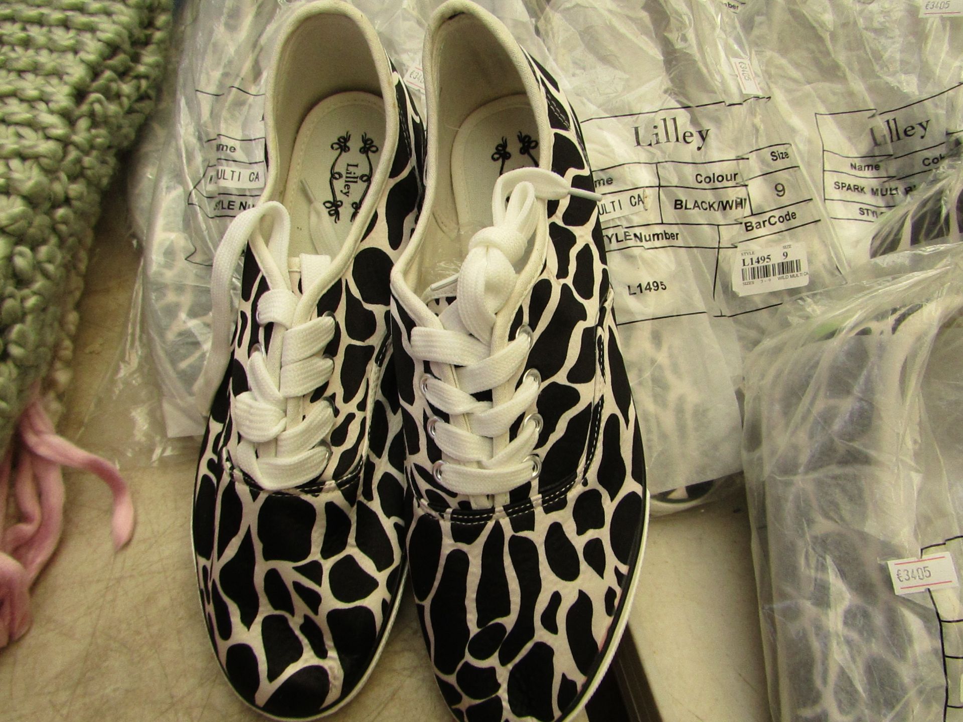 3 X Pairs of Animal Print Canvas shoes all size 9 all new & packaged