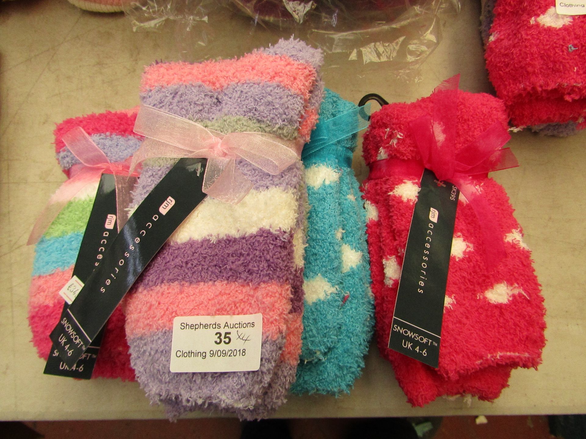 4 X Pairs of Fluffy socks all size 4-6 all new with tags