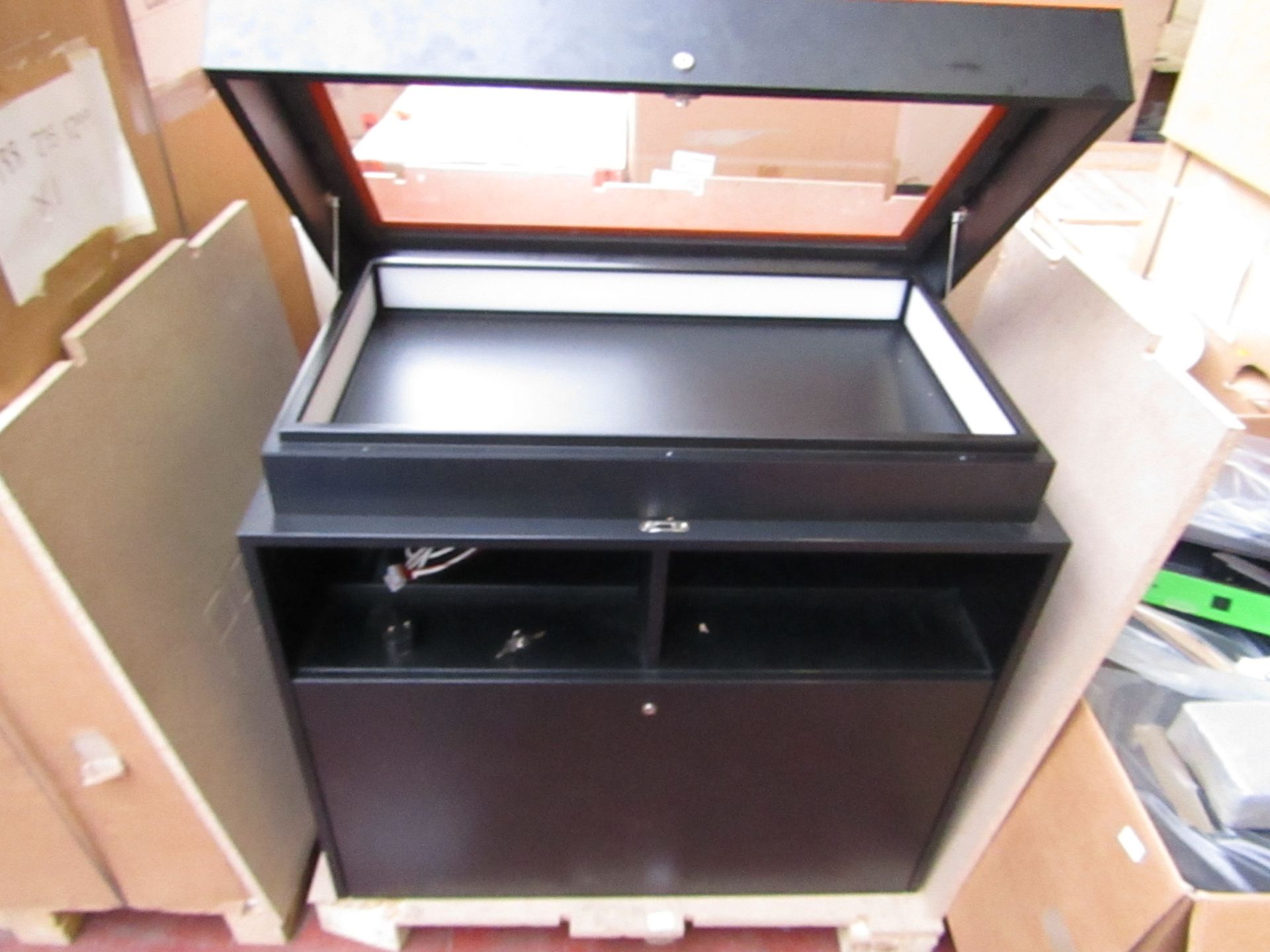 Promotions desk with showcase top with light module built in (working), few scuff marks and left