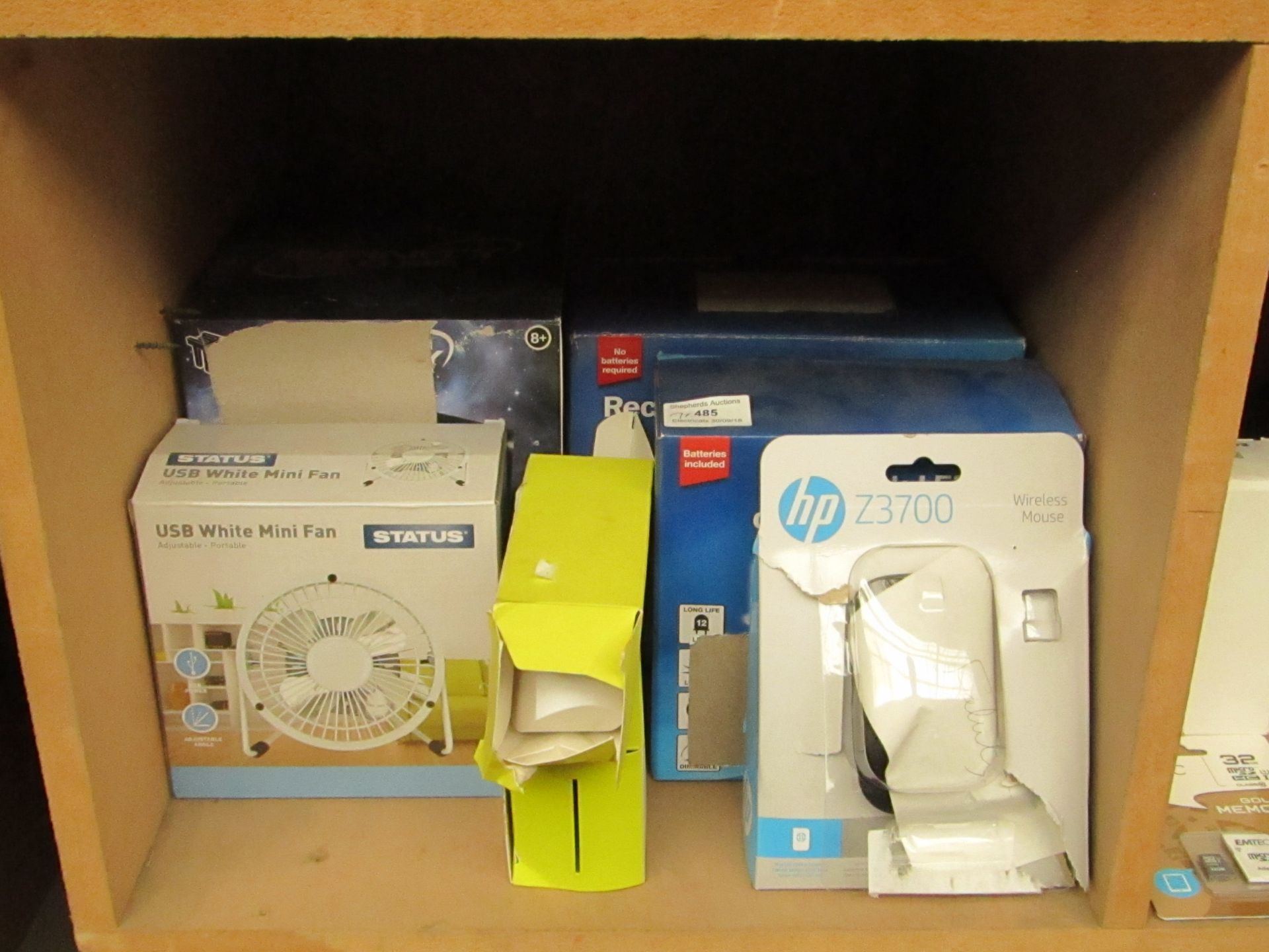 7x Unchecked items which include, Infinity cube light, mini USB fan, Wirelss Mouse, wireless