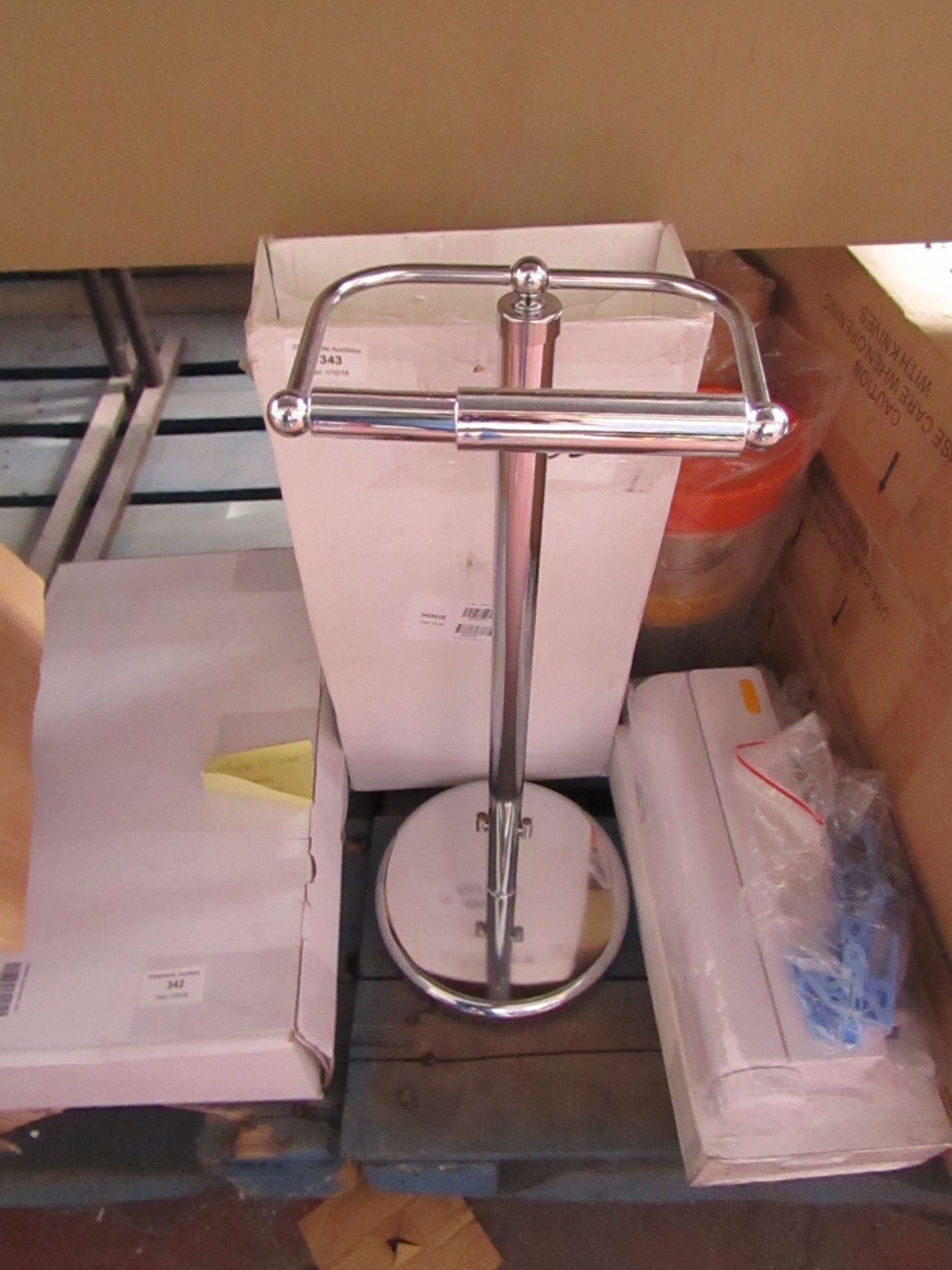 Toilet roll holder and storage rack