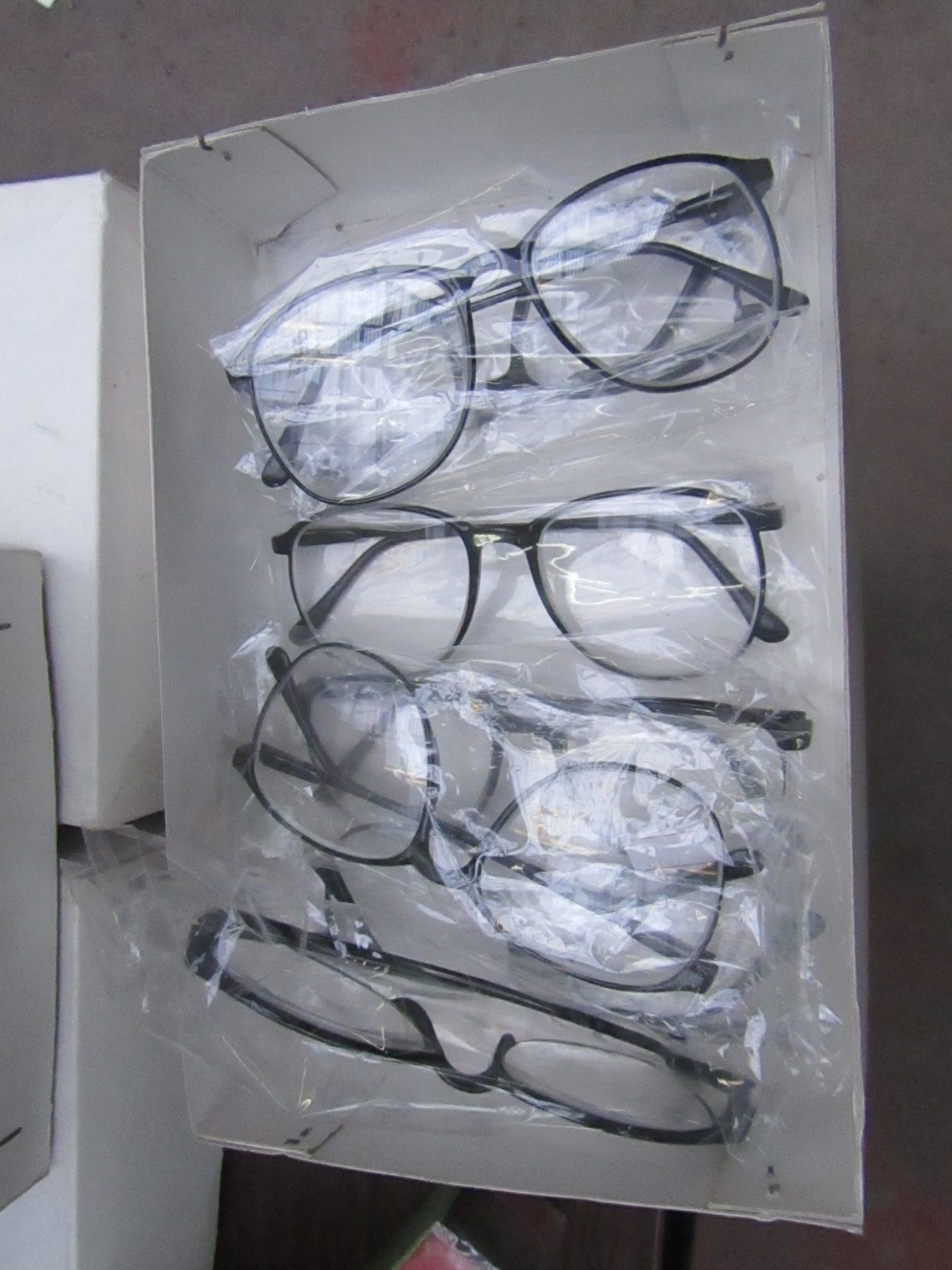 Box of approx 8x glasses with +150 magnification, new