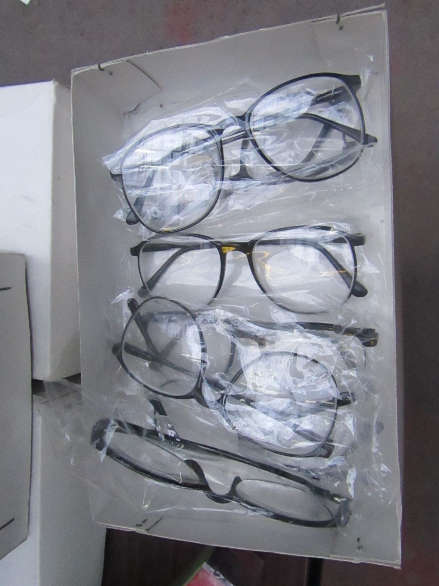 Box of approx 8x glasses with +150 magnification, new