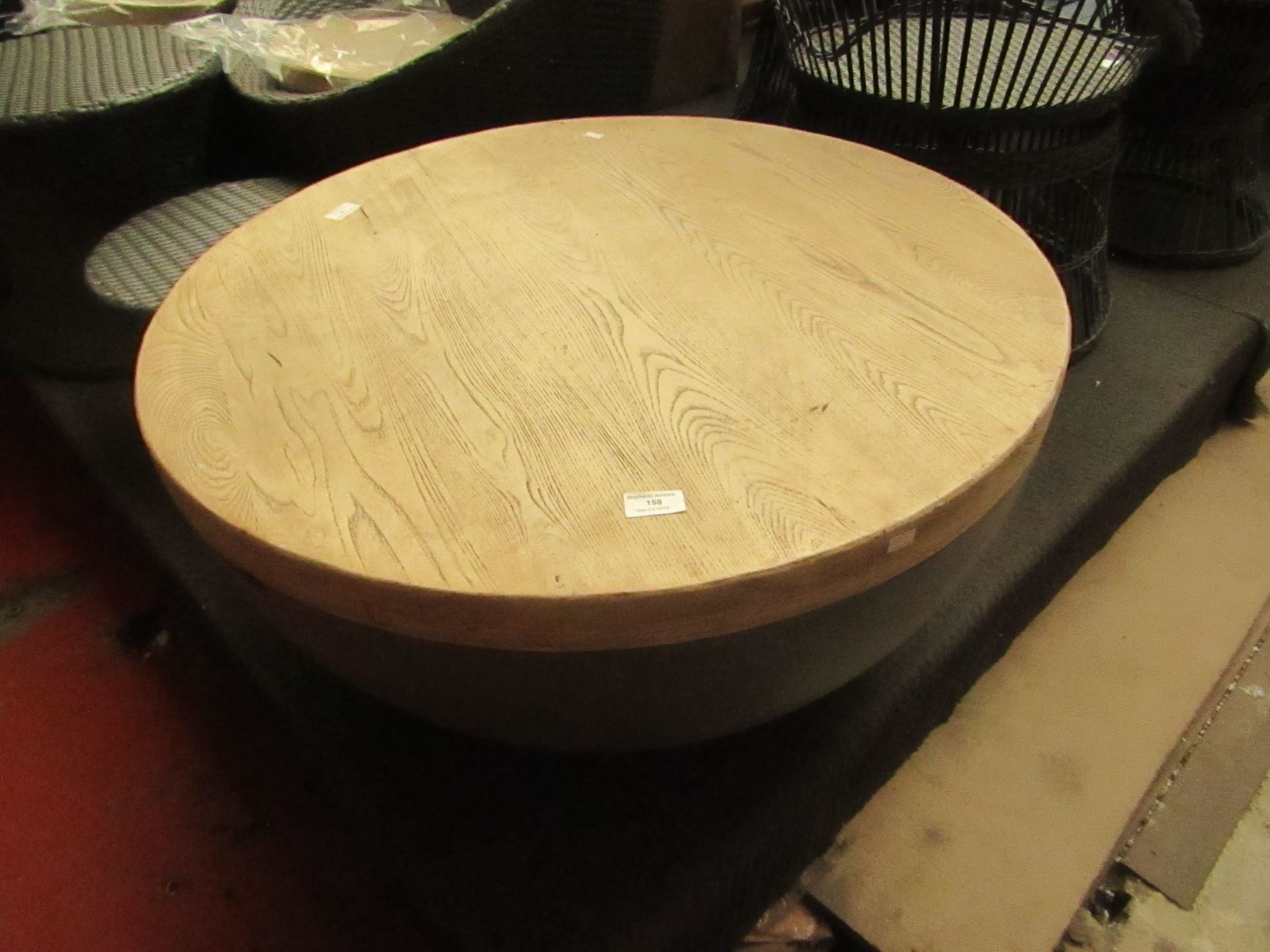 Large round wooden indoor/outdoor table, no major damage. Please note by Bidding on this item you