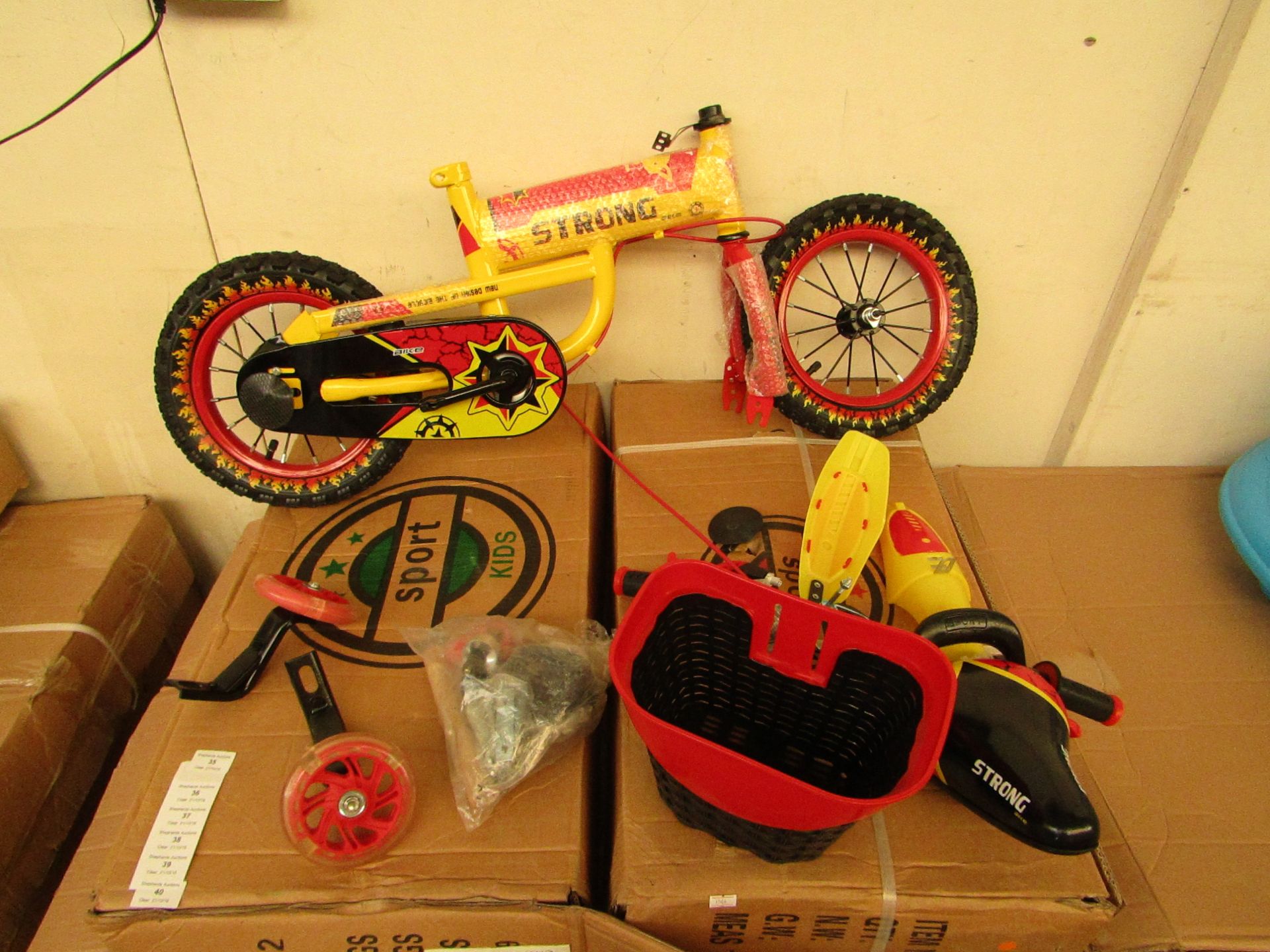 Sport kids Yellow colour bicycle with stabilisers, new and boxed.