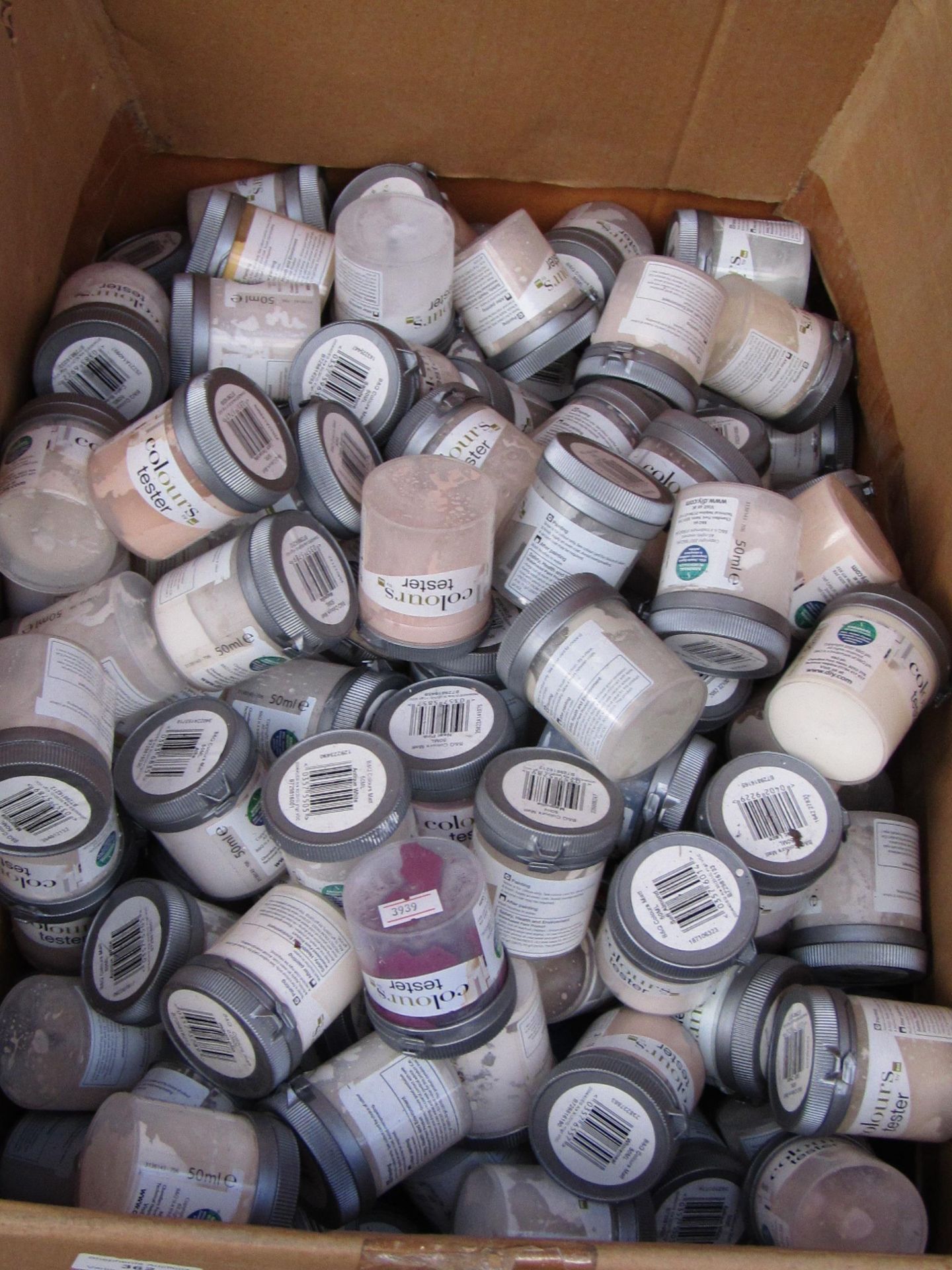 Box containing approx 100+ various colours tester paint pots.