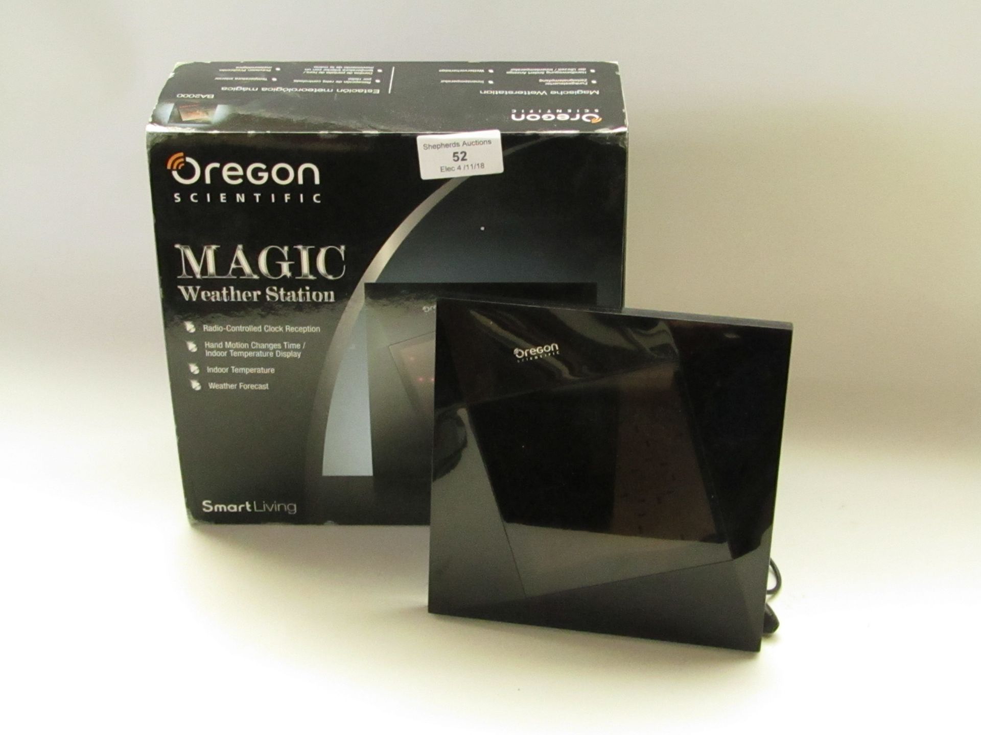 Oregan Scientific magic weather station clock, tested working, it does have a euro plug but we