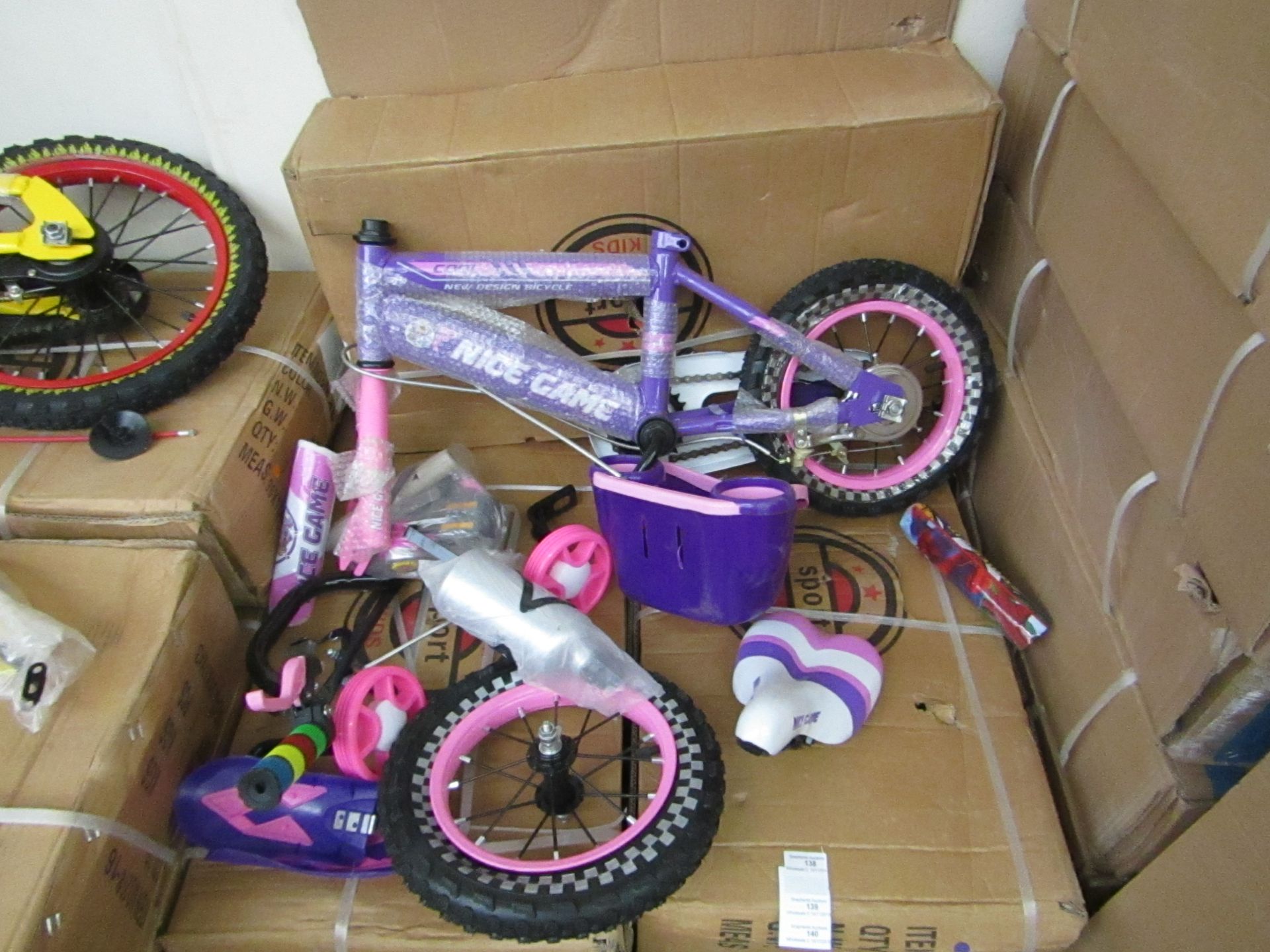 12" Child's Bike new and Boxed, comes complete with front basket, mud guards, water bottle and