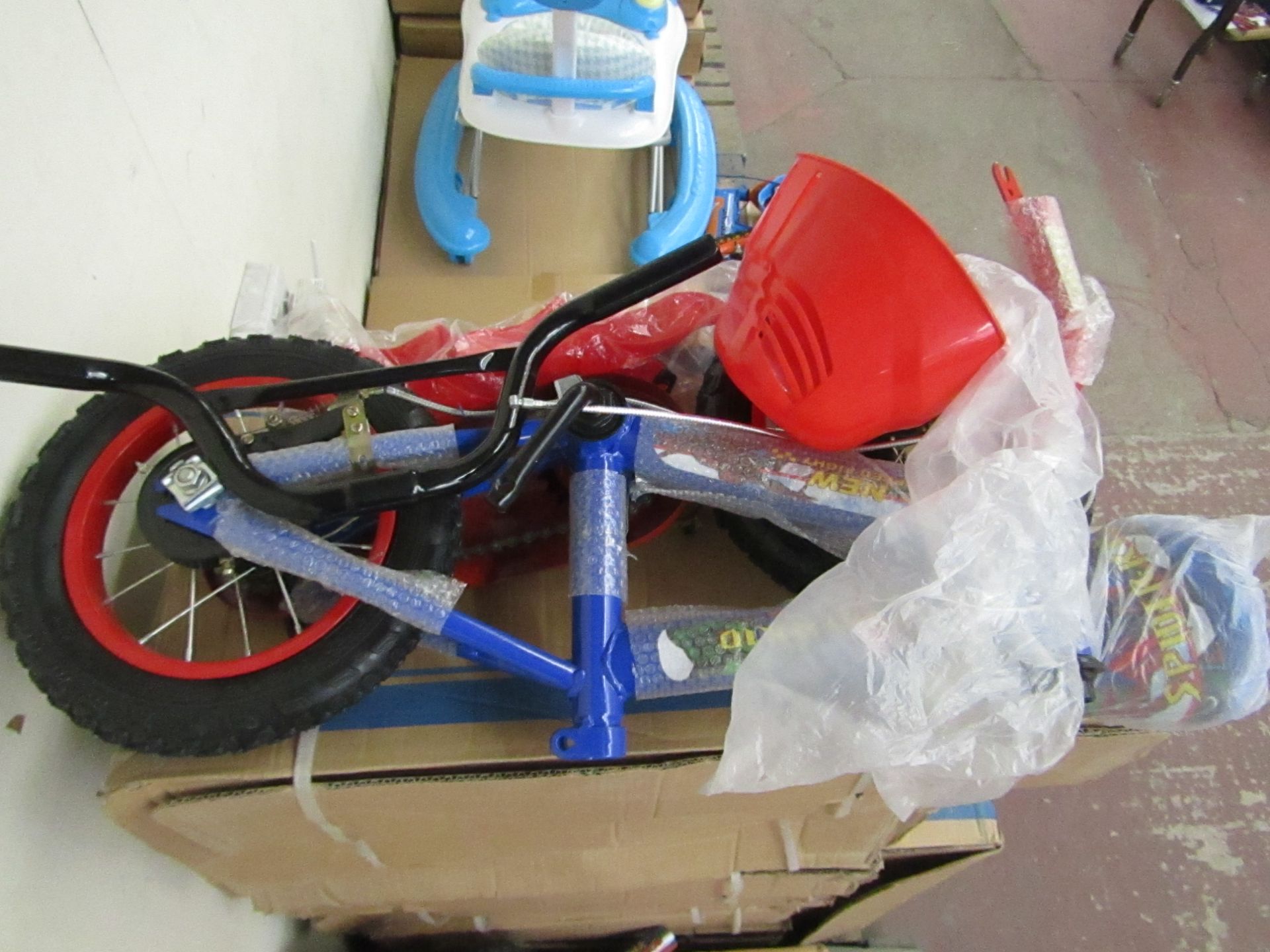 12" Child's Bike new and Boxed, comes complete with front basket, mud guards, water bottle and