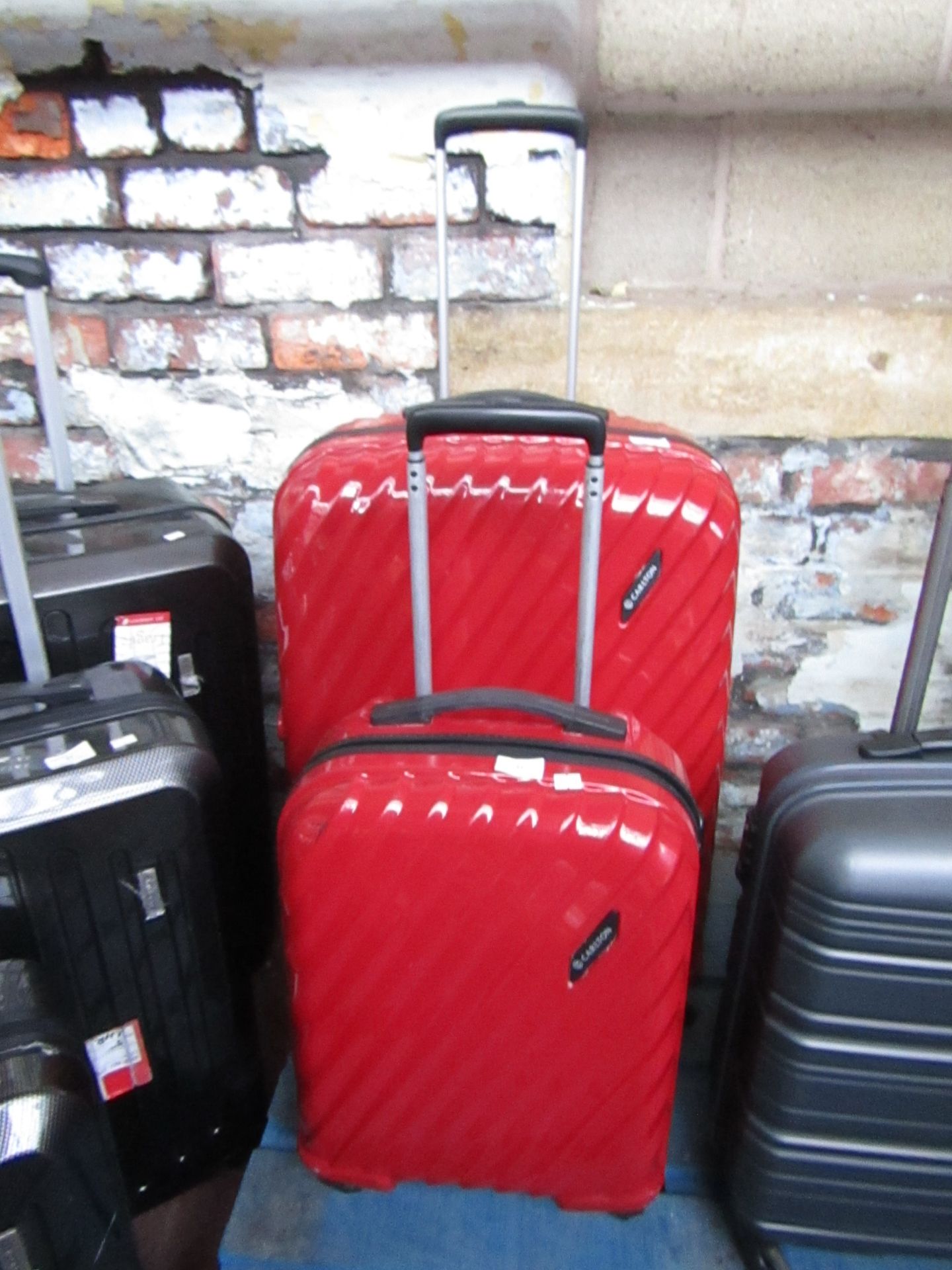 Set of 2 Carlton 4 wheel Hard shell Suitcases, used
