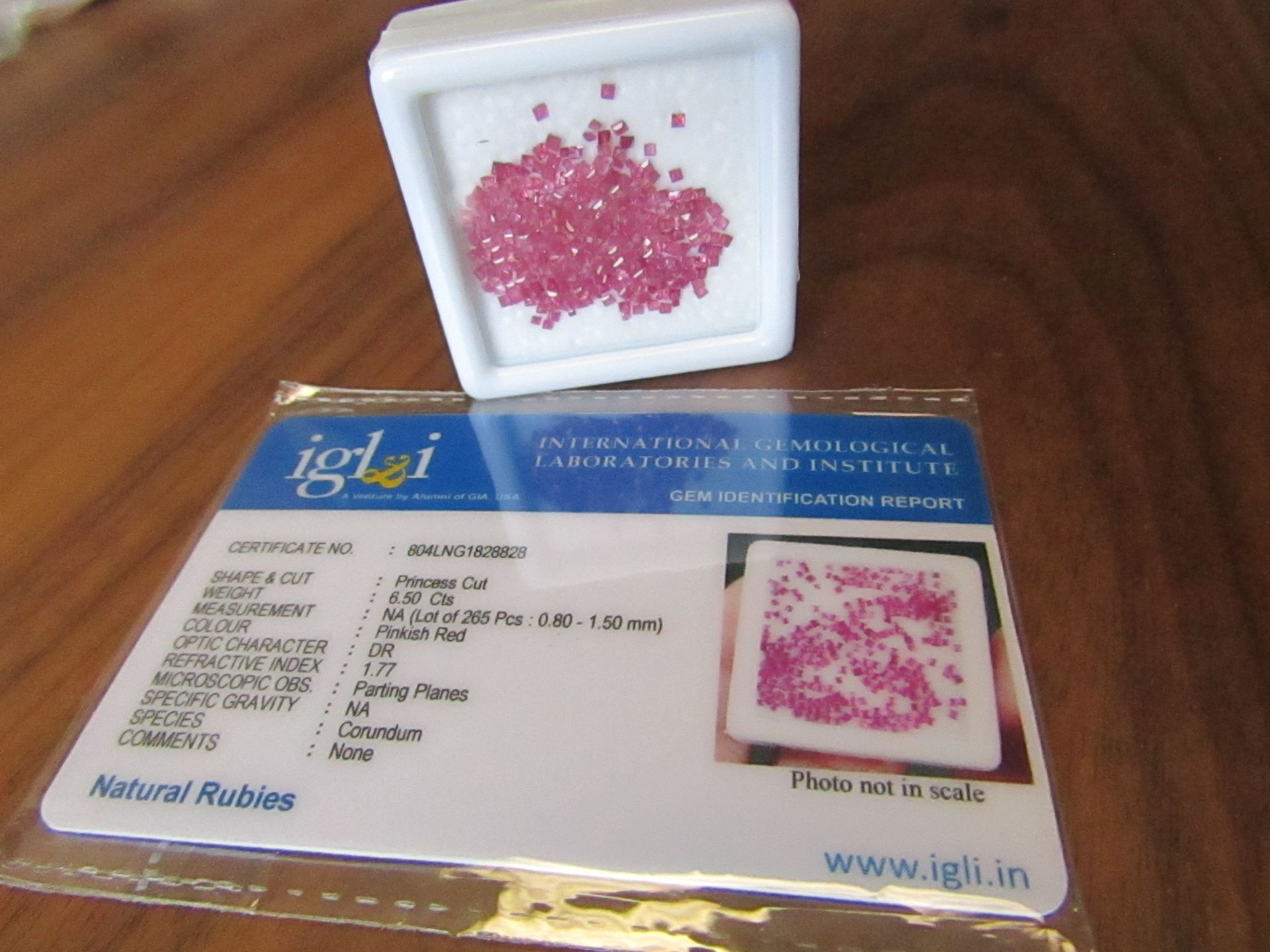 265 pieces Pinkish Red Natural Rubies. Princess Cut. Total Weight 6.50 Carats. As per Gem