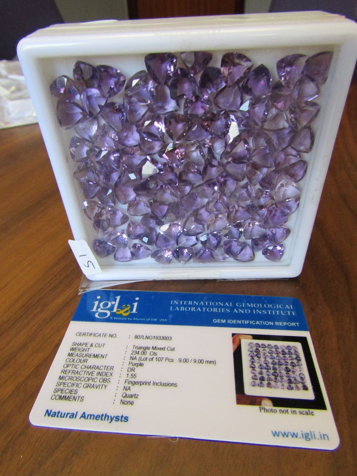 107 pieces Purple Natural Amethysts. Triangle Mixed Cut. Total Weight 234.00 Carats. As per Gem