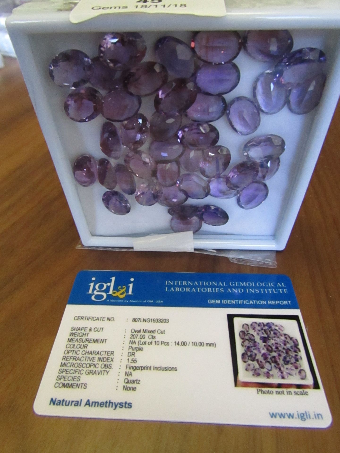 10 pieces Purple Natural Amethysts. Oval Mixed Cut. Total Weight 207 Carats. As per Gem