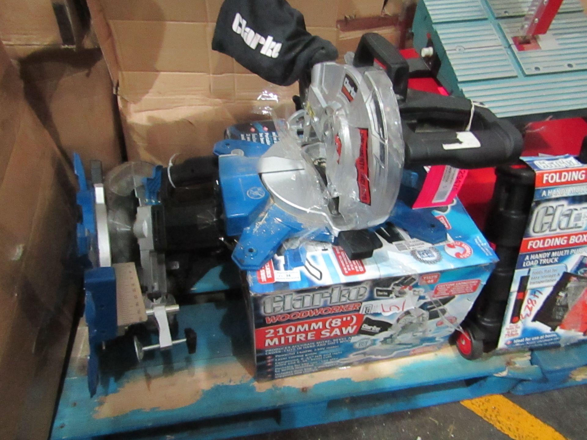 3x Clarke CMS210 210mm 1400W Mitre Saw (230V), RRP £59.98 Please note; this is a raw return and