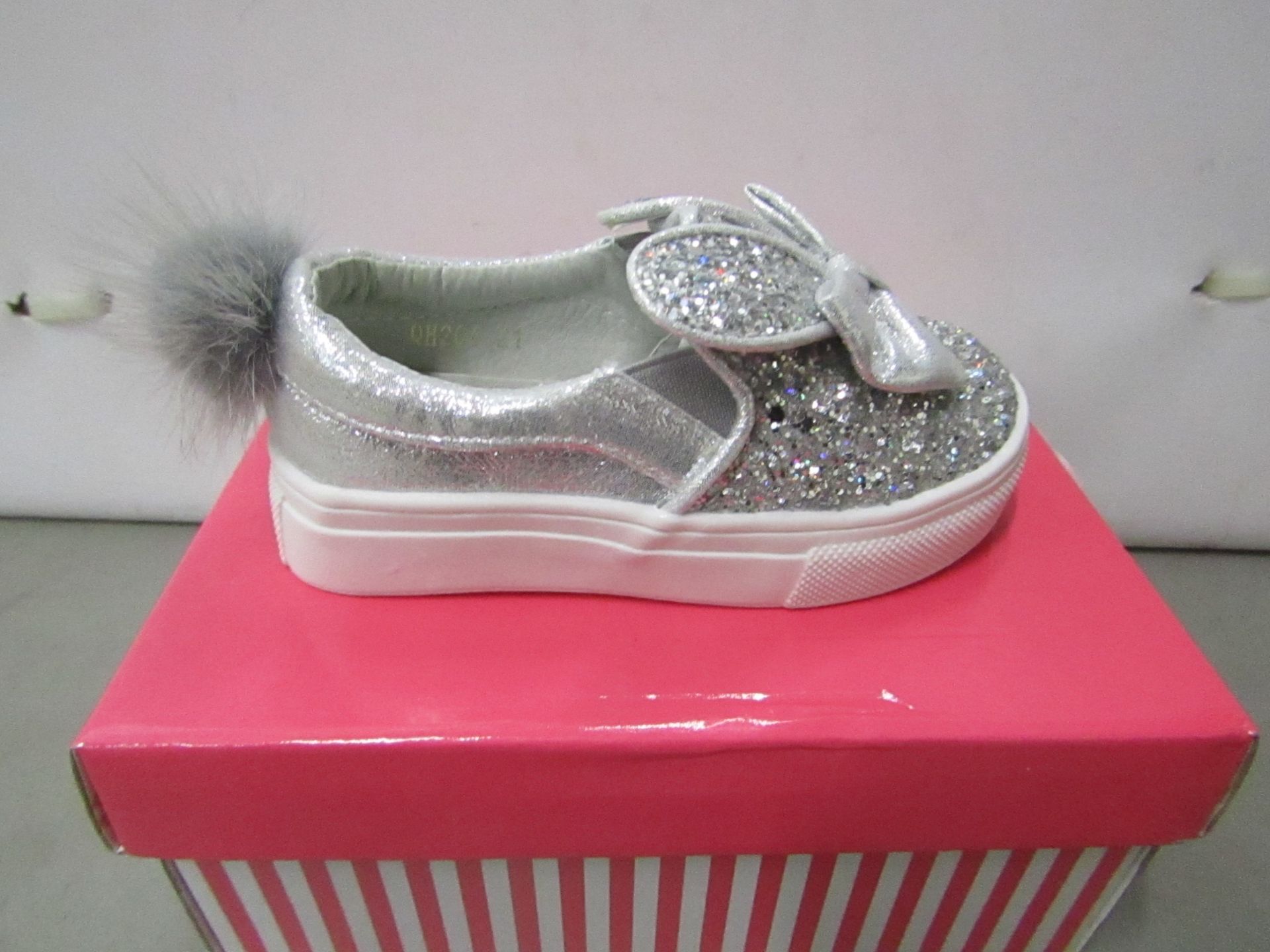 Miss Sophia Girls silver shoe with sequence  design on the main body of the shoe also bow on front &