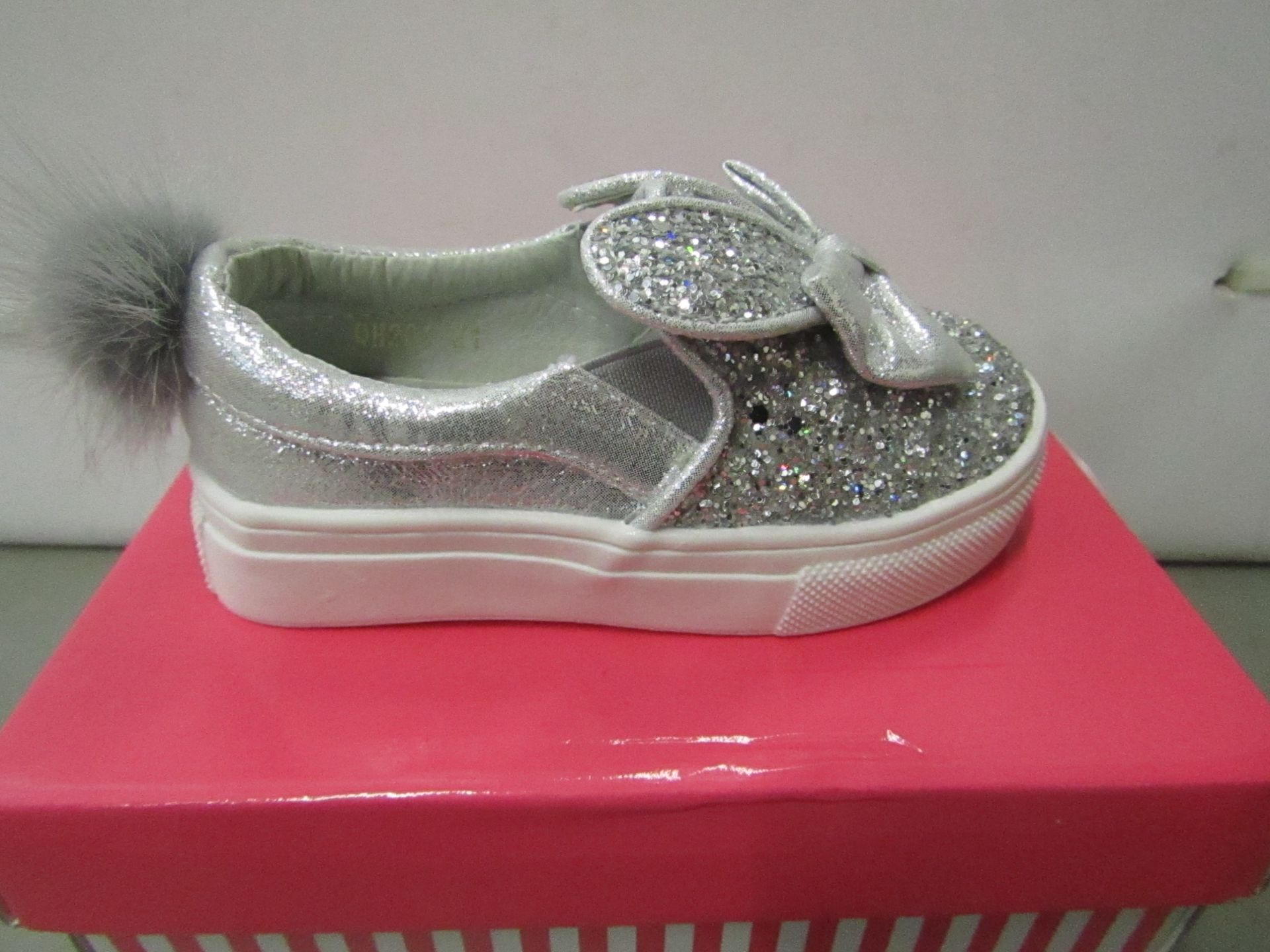 Miss Sophia Girls silver shoe with sequence  design on the main body of the shoe also bow on front &