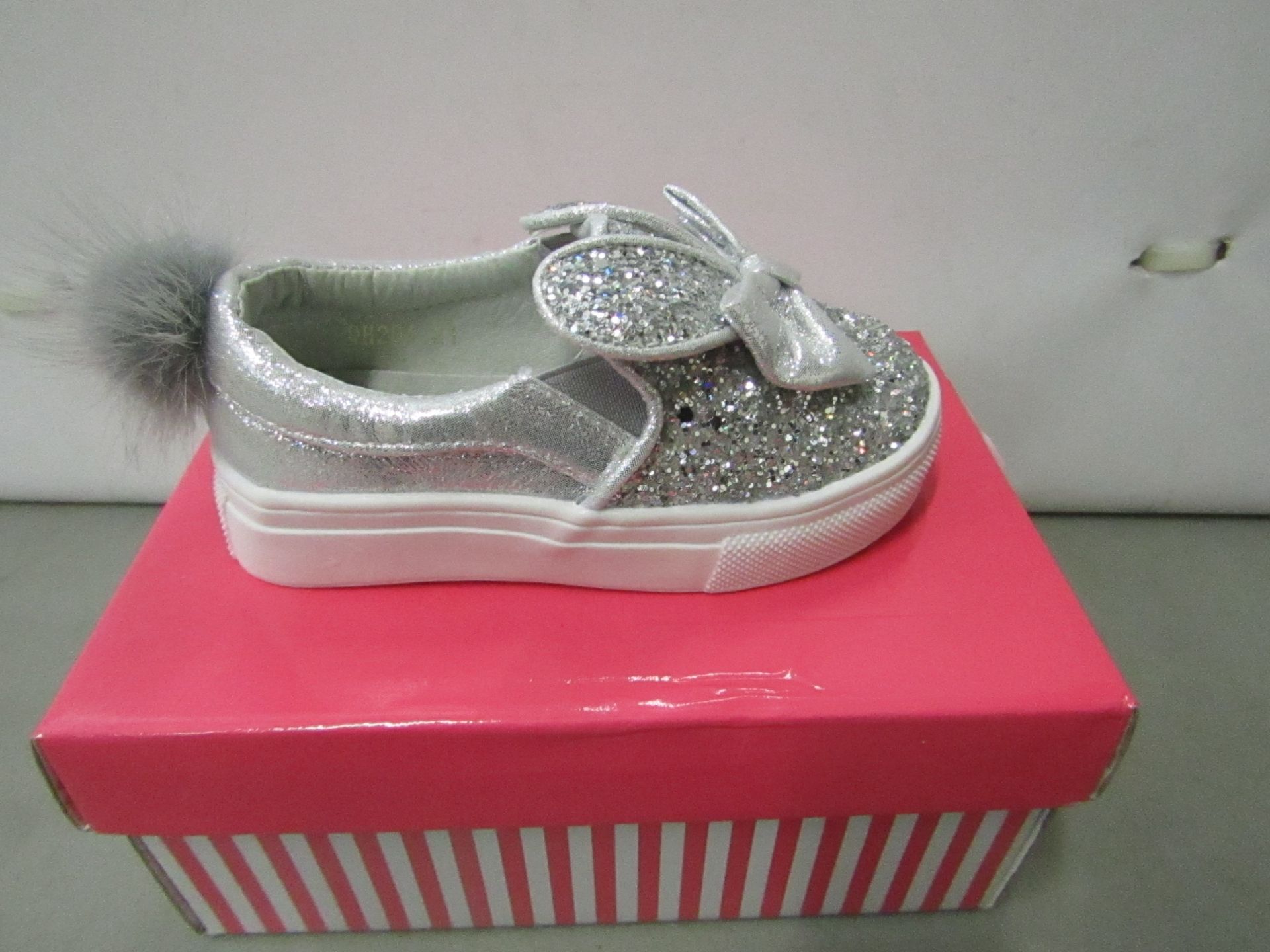 Miss Sophia Girls silver shoe with sequence  design on the main body of the shoe also bow on front &