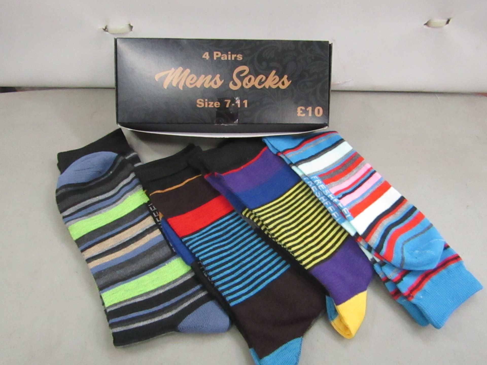 4 X Pairs of Mens Socks size 7-11 new & boxed,( please note the colour & design may vary from