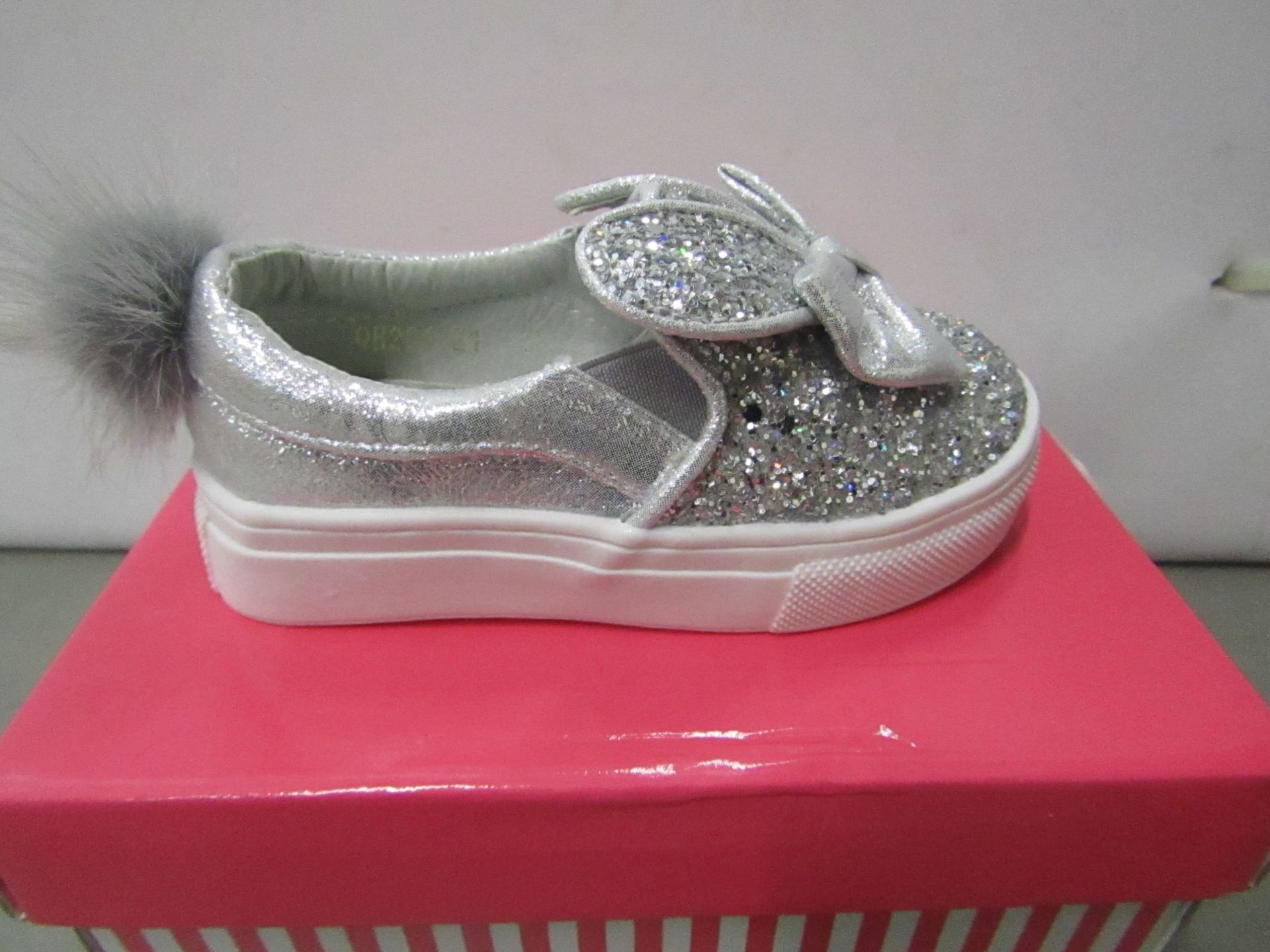 Miss Sophia Girls silver shoe with sequence  design on the main body of the shoe also bow on front &
