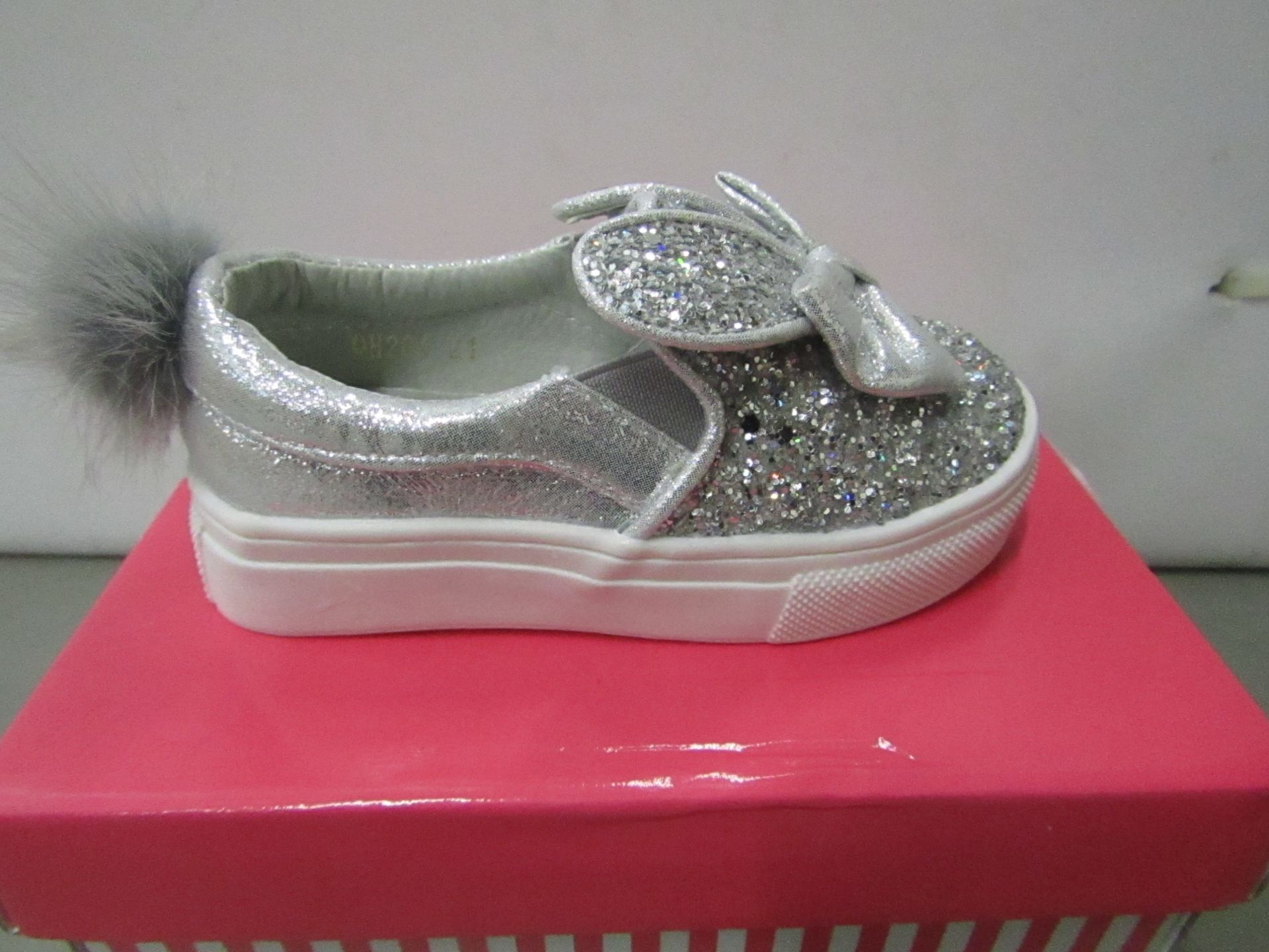 Miss Sophia Girls silver shoe with sequence  design on the main body of the shoe also bow on front &