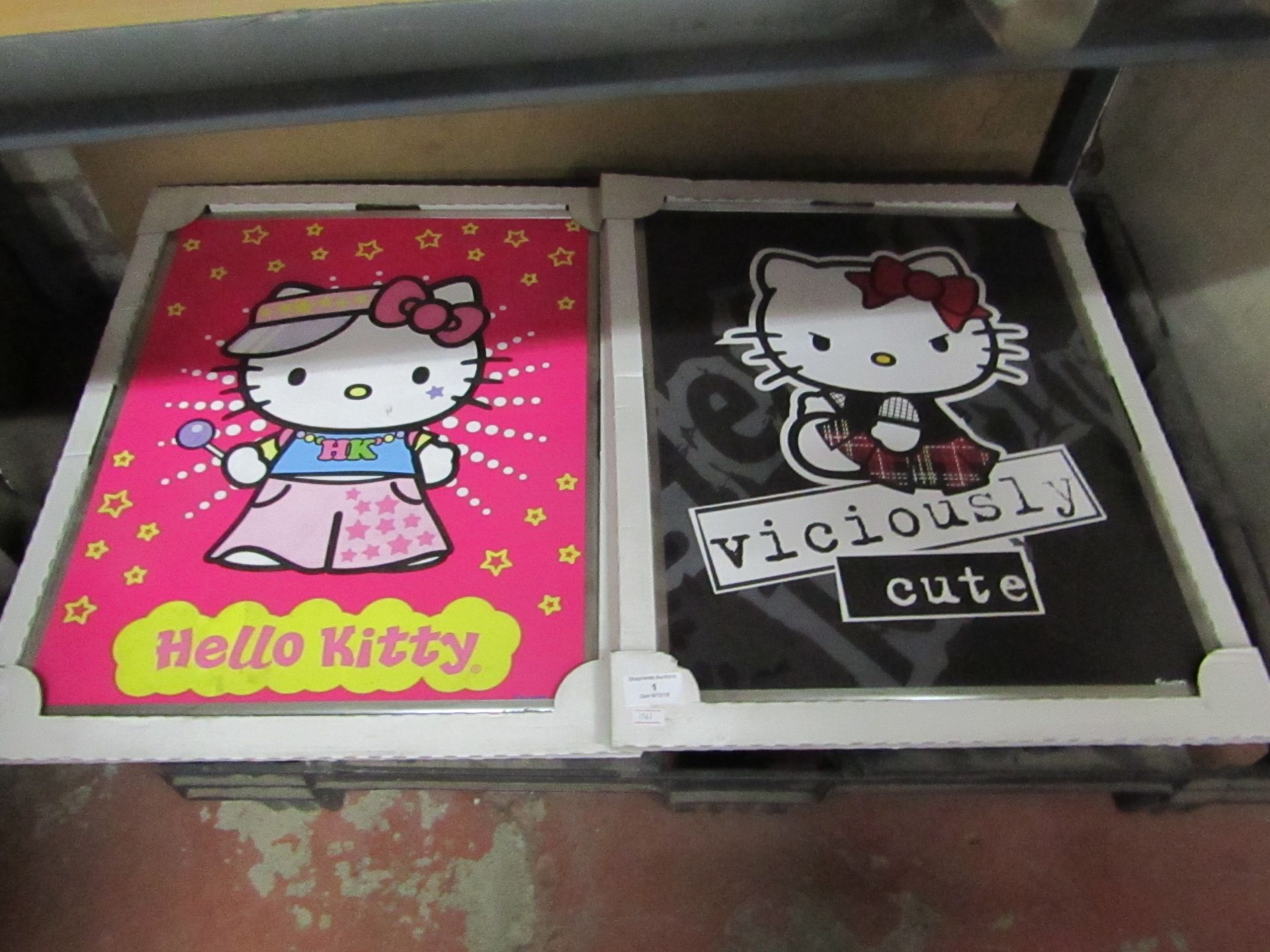 Set of 2x various hello kitty posters with frames, unchecked
