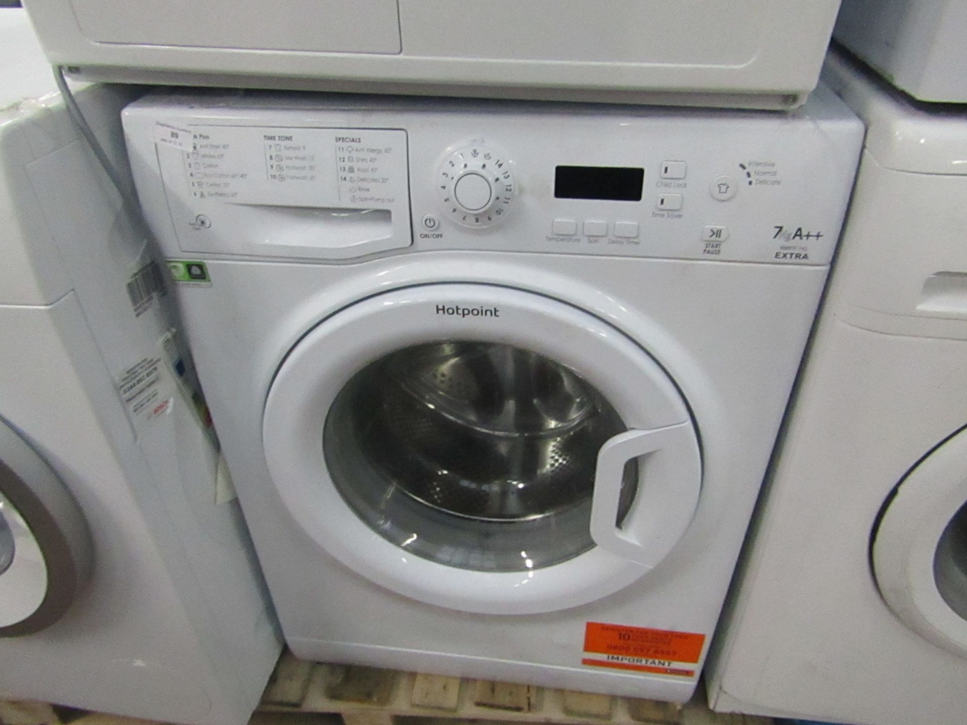 Hotpoint Extra 7Kg washing machine, powers on and spins.