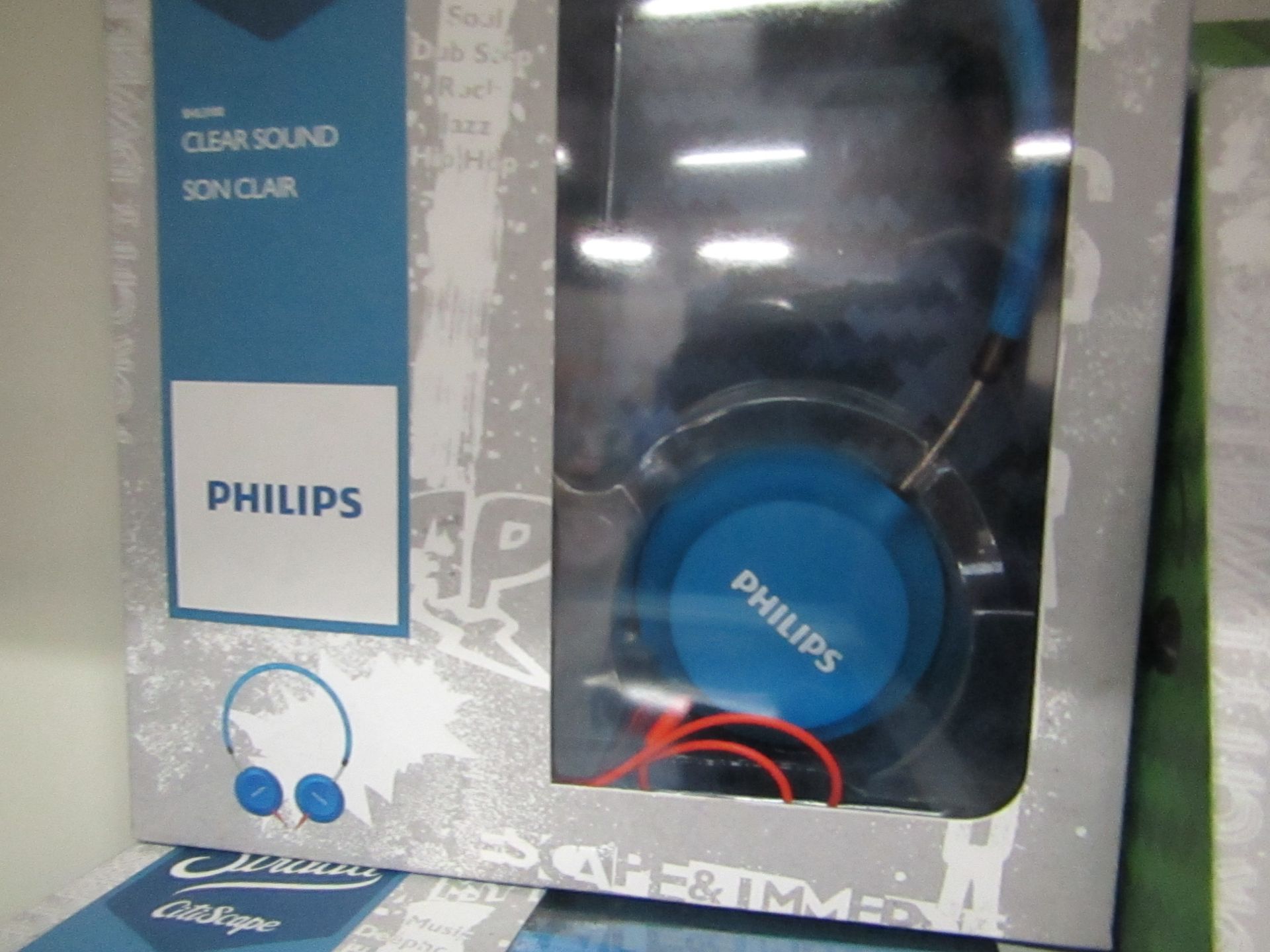 Philips Strada headphones, tested working and boxed.