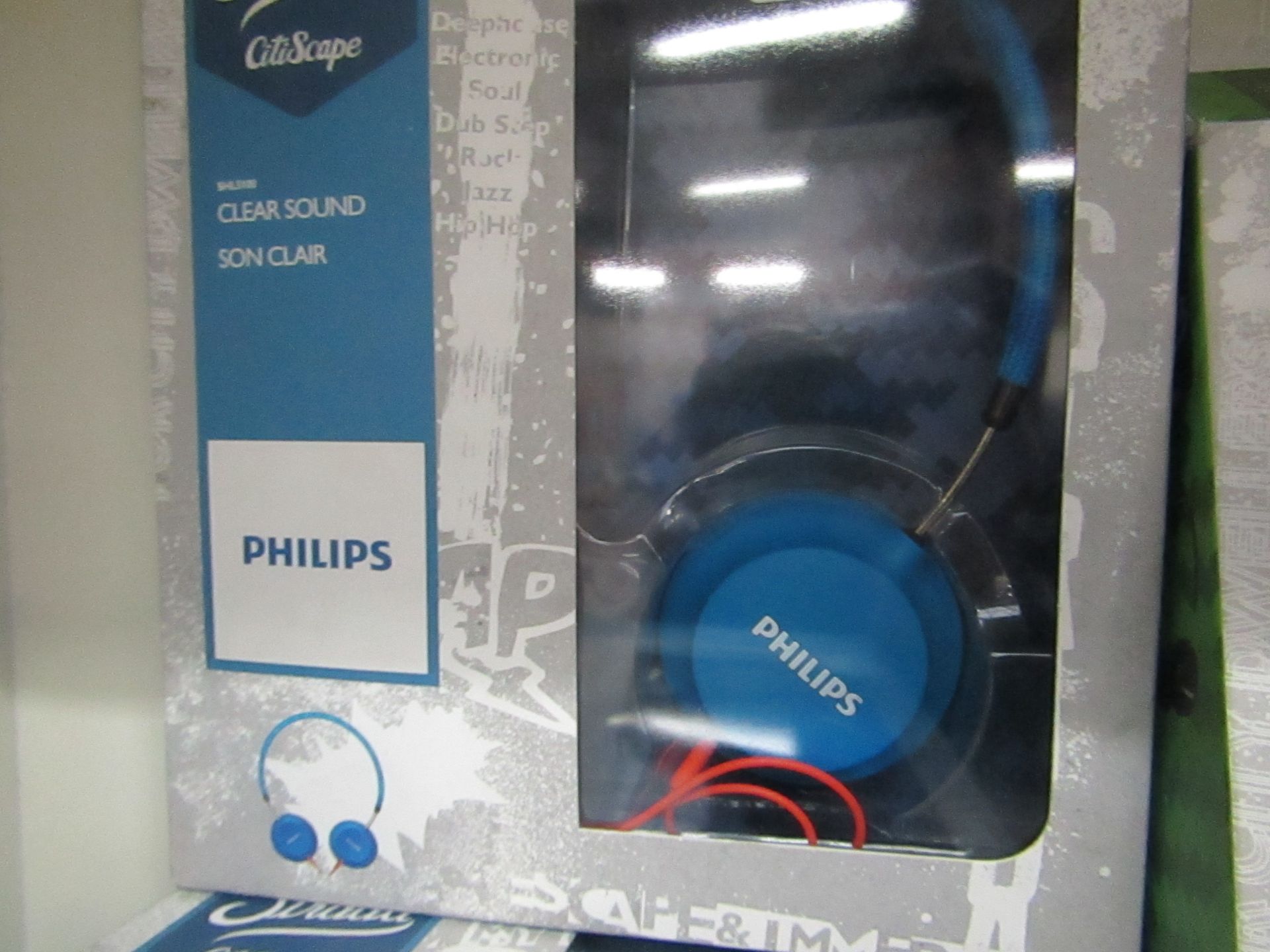 Philips Strada headphones, tested working and boxed.