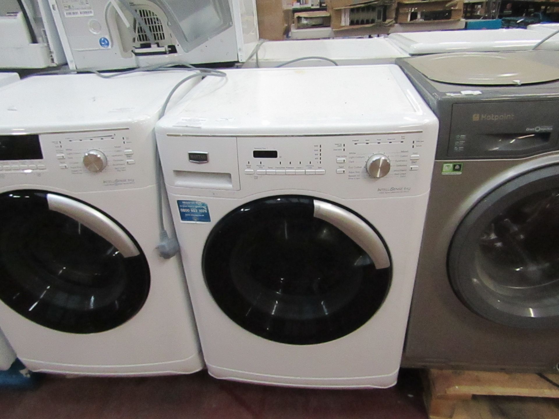 Maytag IntelliSense 8Kg washing machine, powers on and spins.