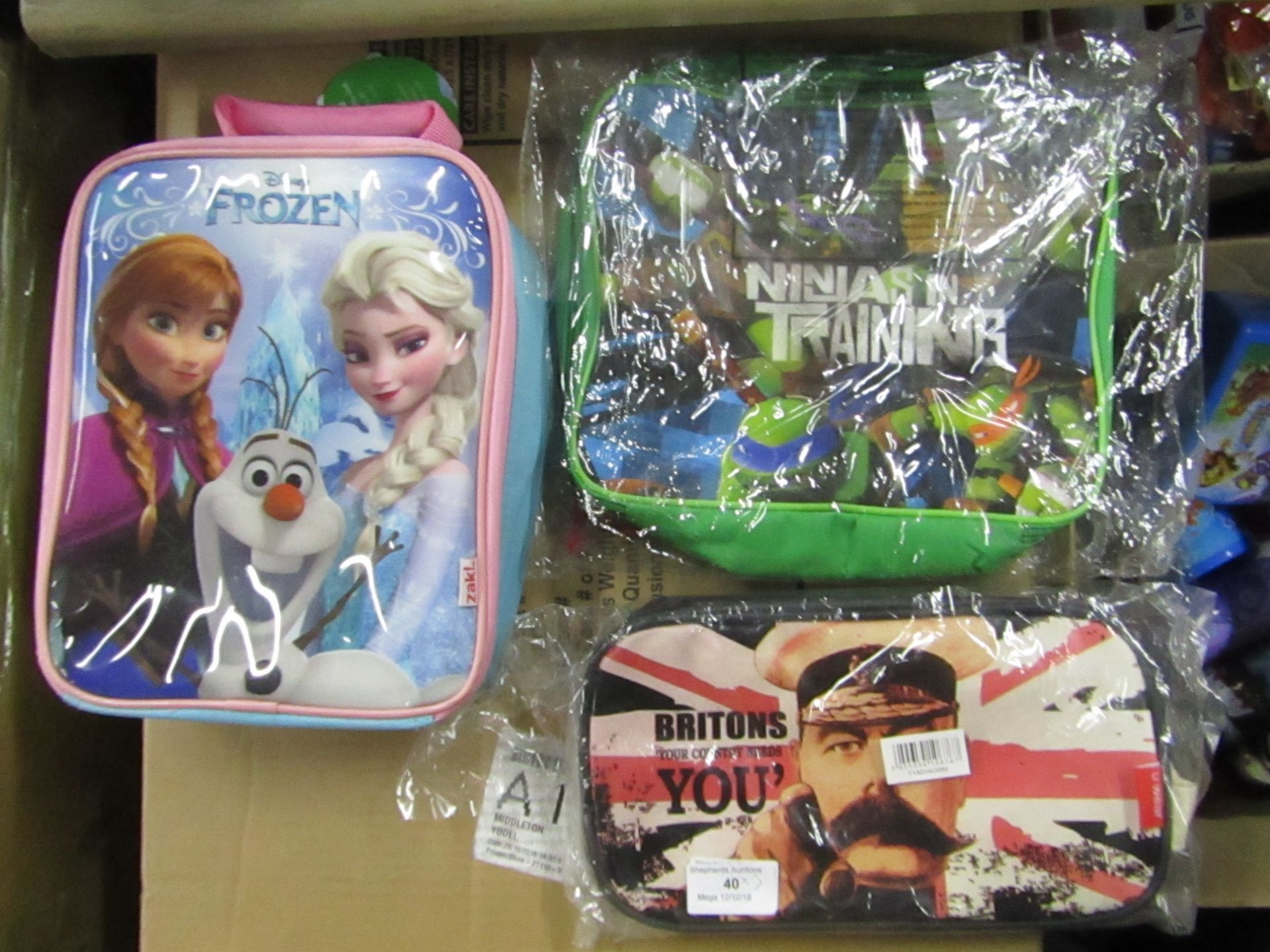 3x items being a Disney Frozen Lunch Bag, a Ninja Turtles Lunch Bag and a Your County Needs You wash