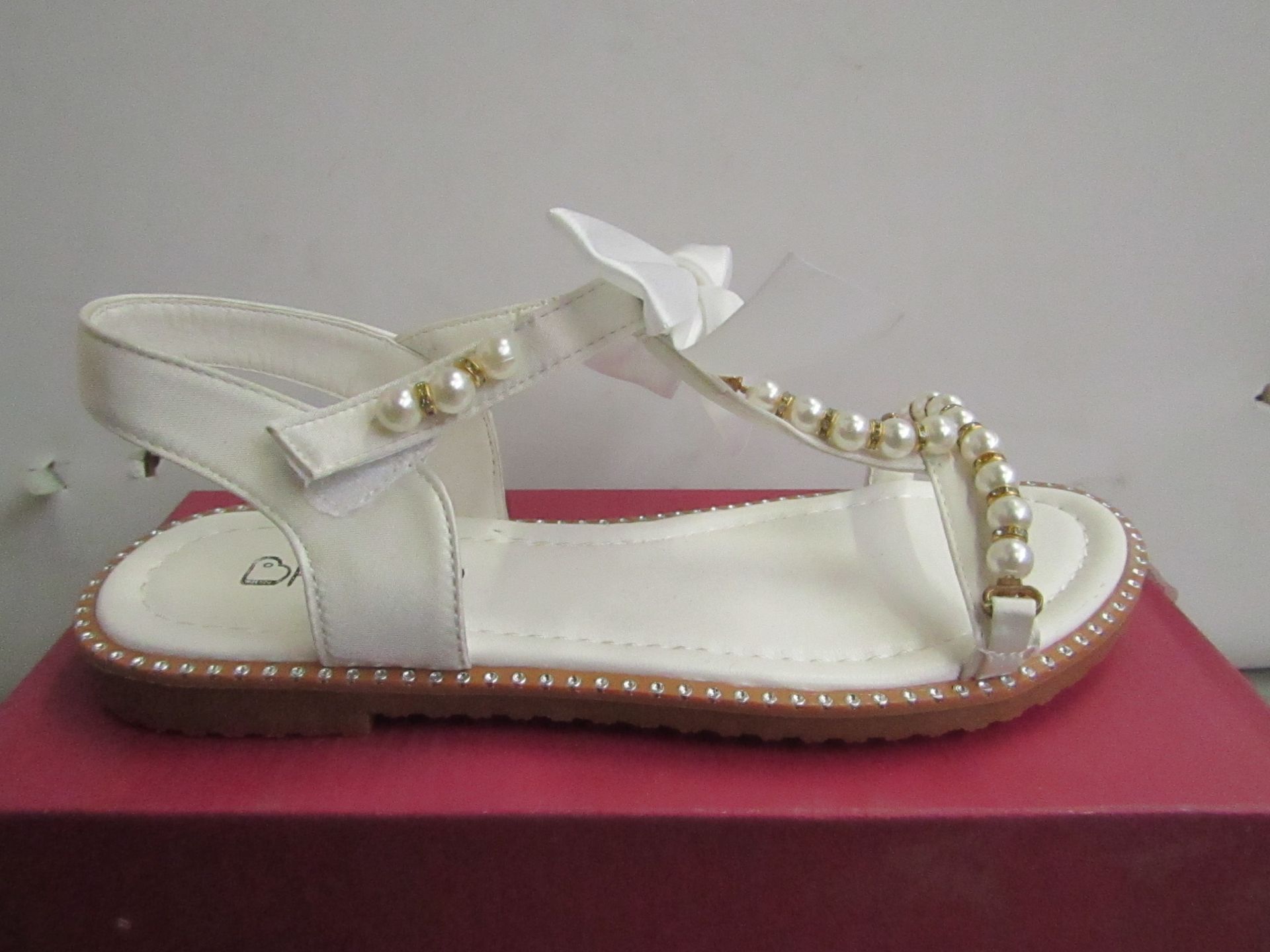 Kelsi Girls sandal with bead design and bow on the front size 13 new & boxed