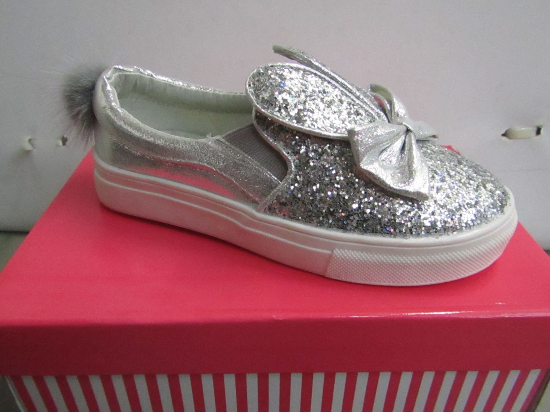 Miss Sophia Girls silver shoe with sequence  design on the main body of the shoe also bow on