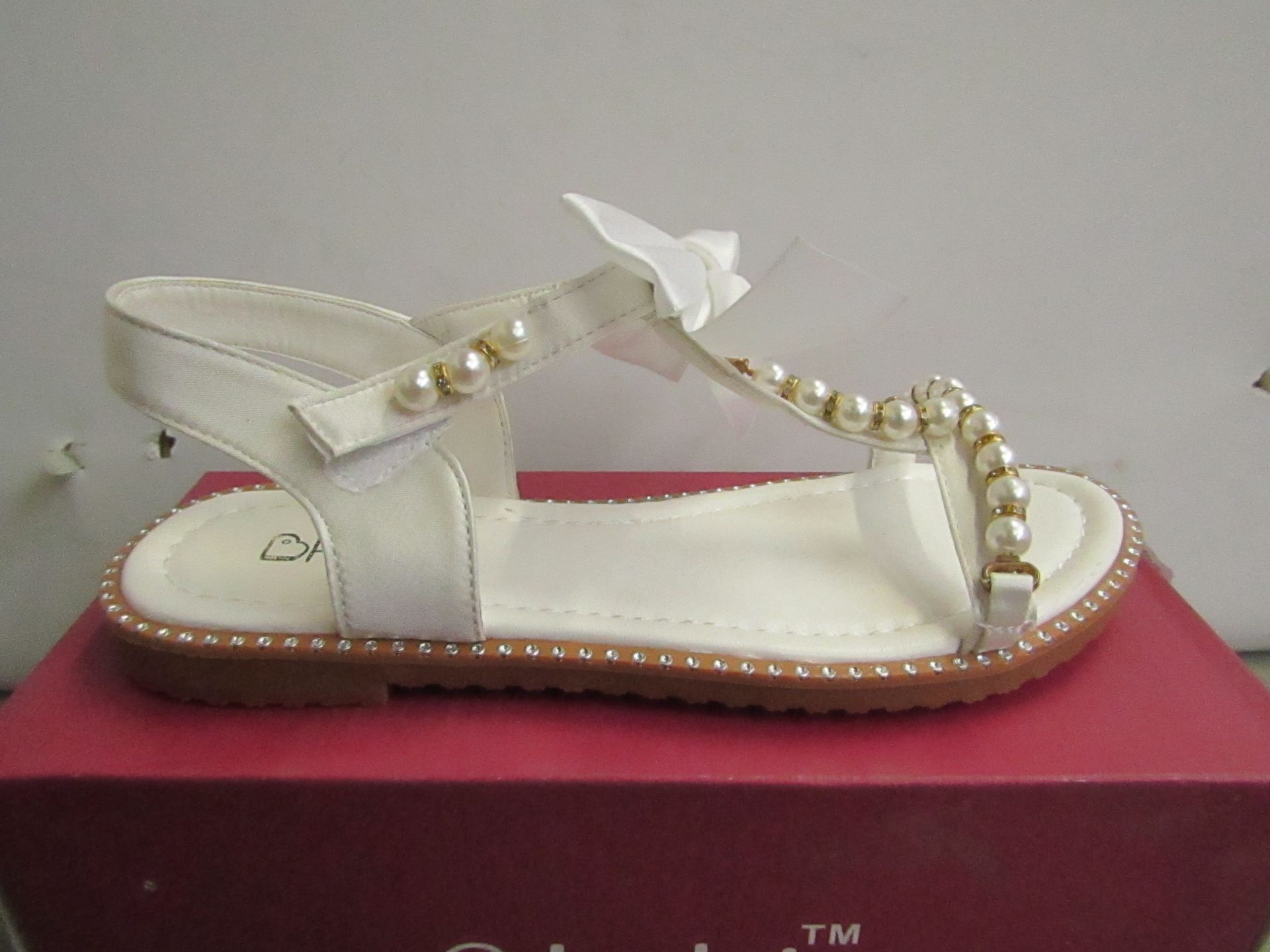 Kelsi Girls sandal with bead design and bow on the front size 10 new & boxed