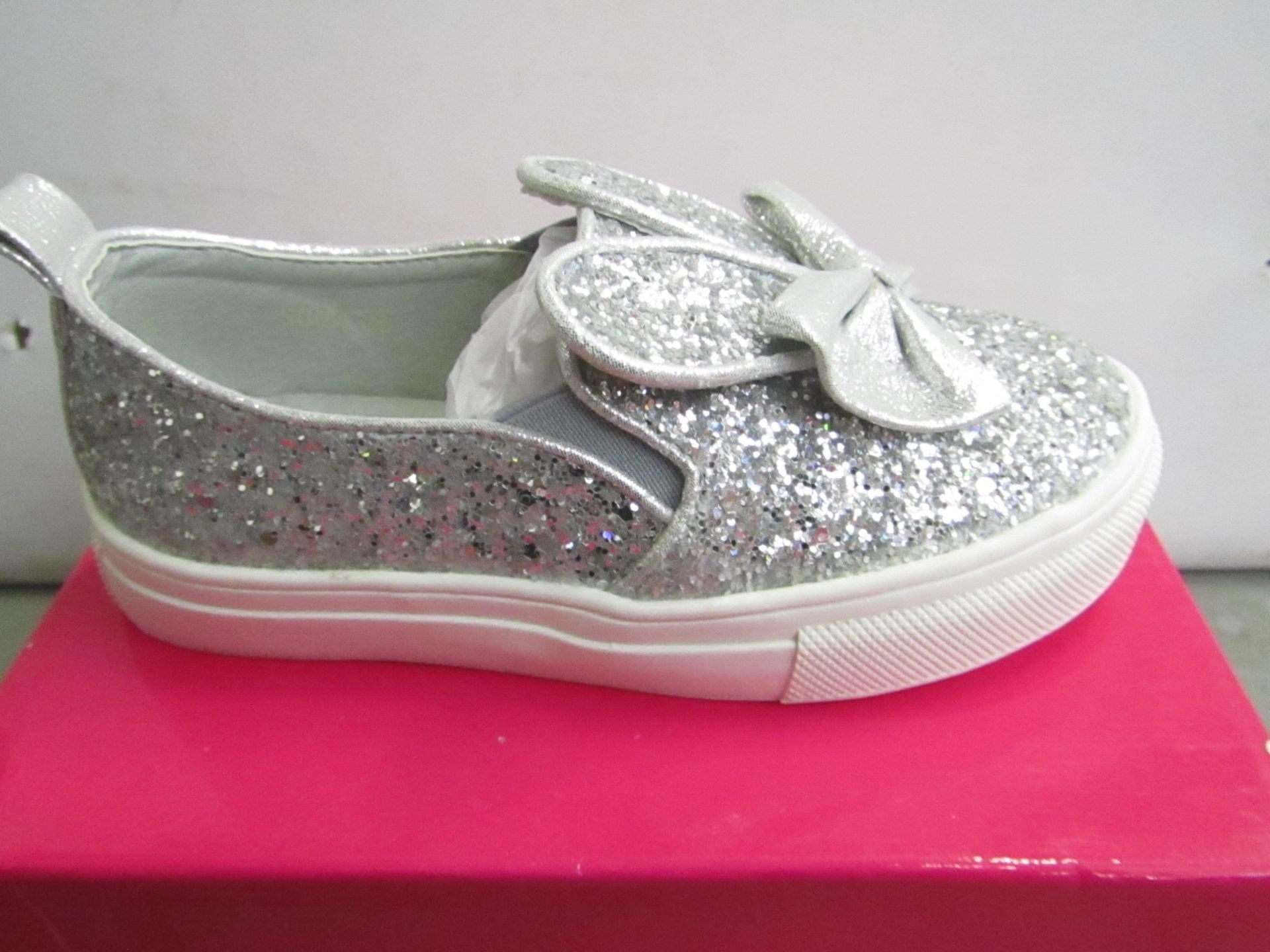 Miss Sophia Girls silver shoe with sequence  design on the main body of the shoe also bow on