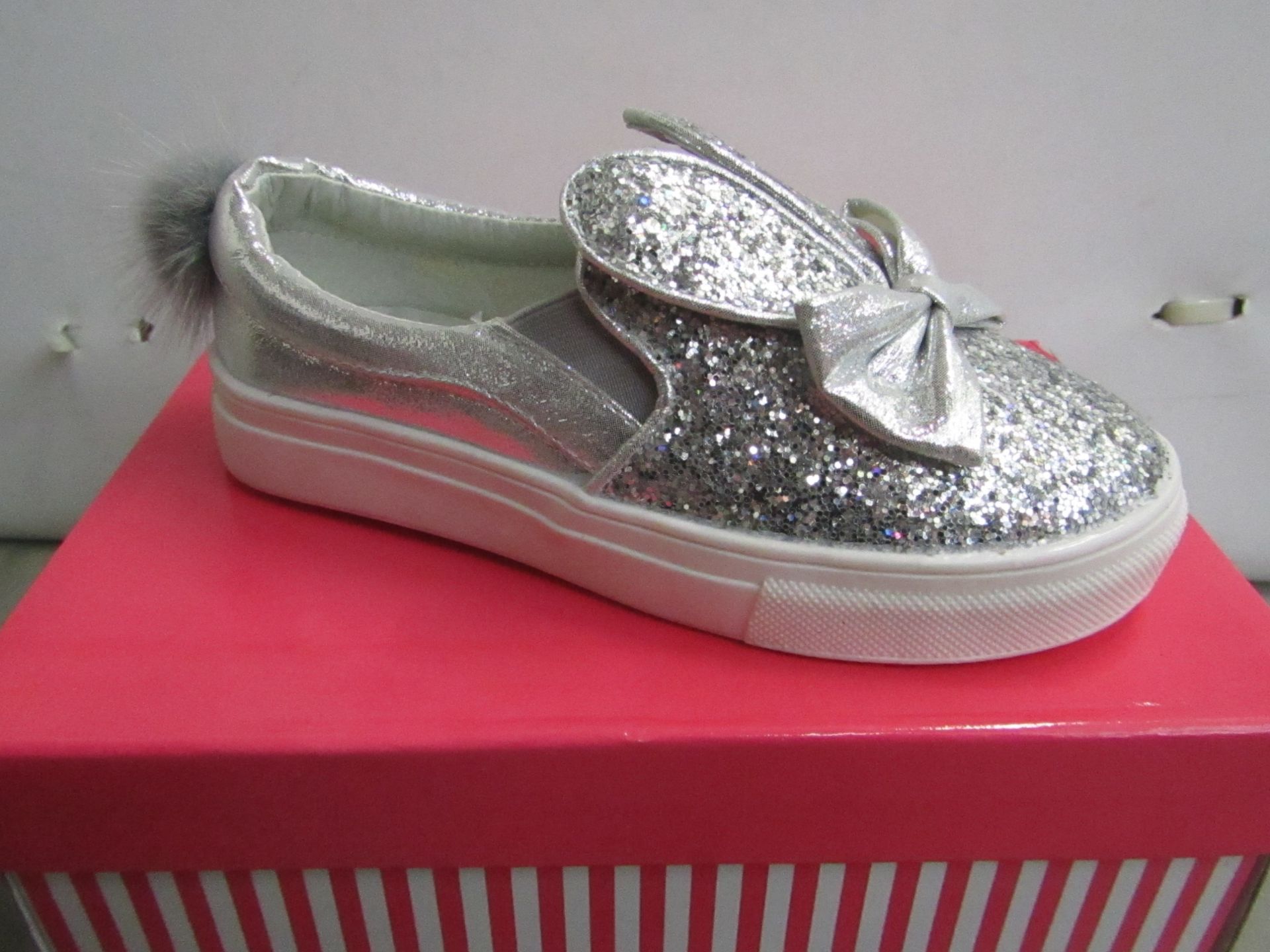 Miss Sophia Girls silver shoe with sequence  design on the main body of the shoe also bow on