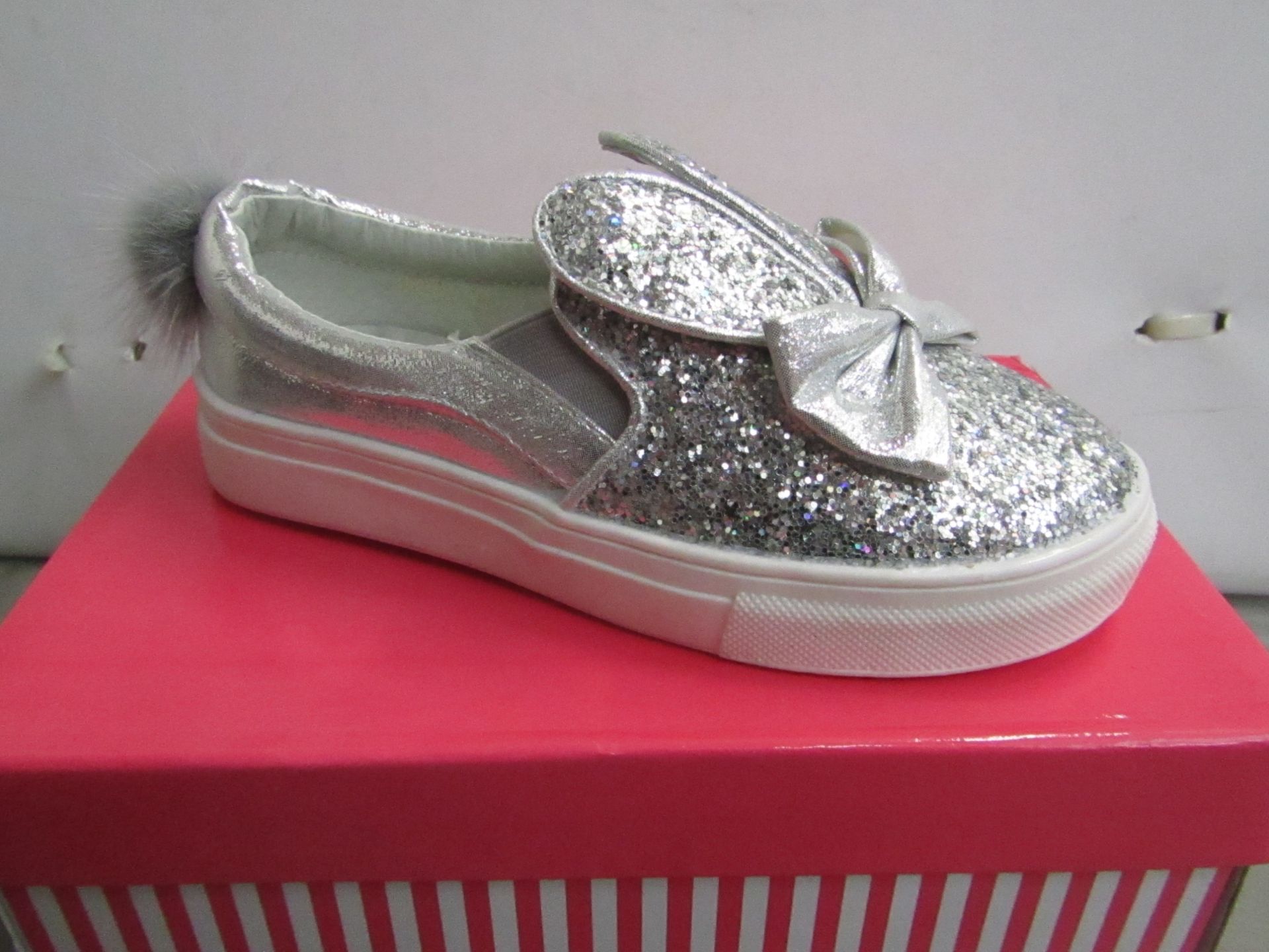 Miss Sophia Girls silver shoe with sequence  design on the main body of the shoe also bow on front &