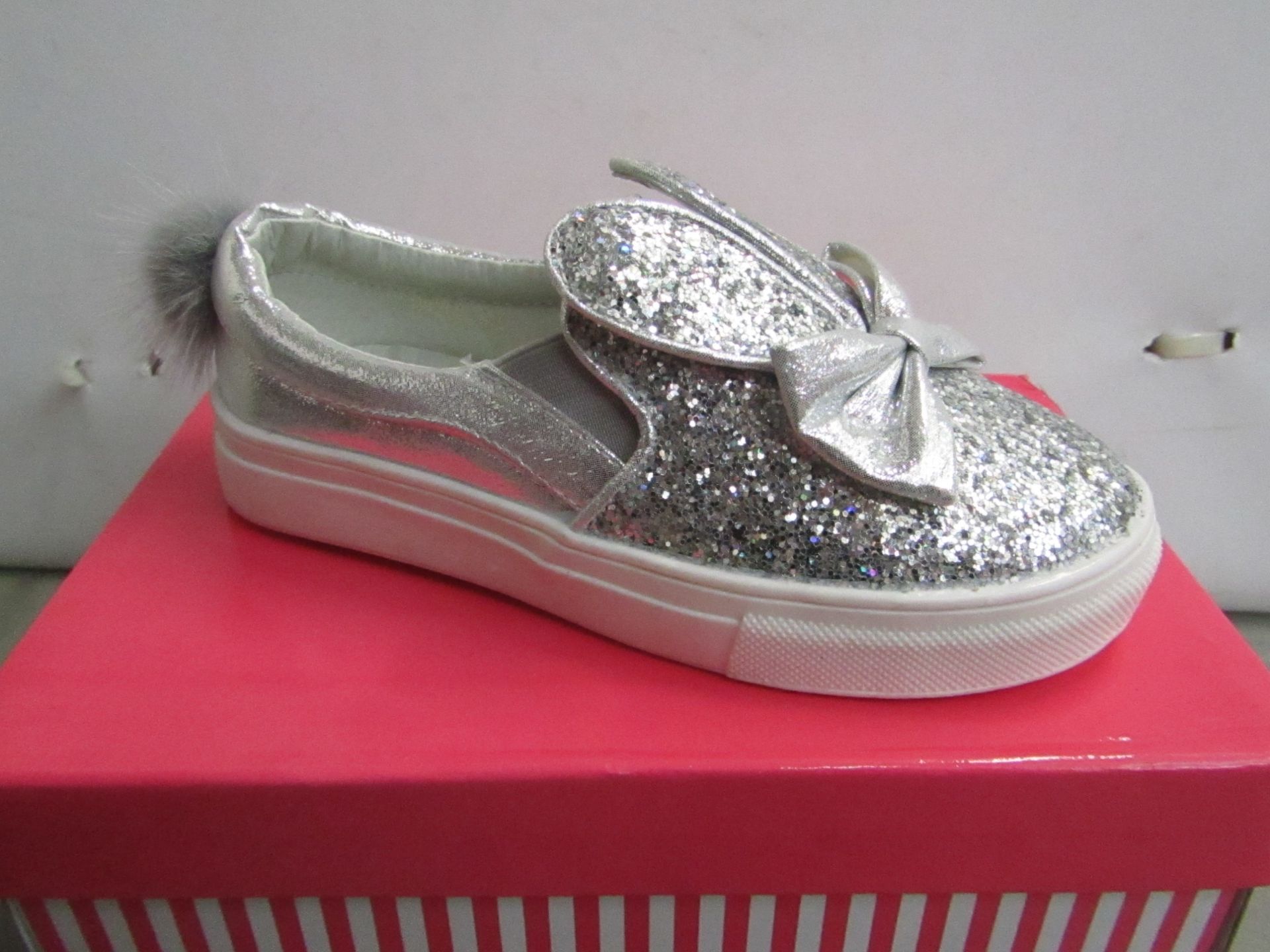 Miss Sophia Girls silver shoe with sequence  design on the main body of the shoe also bow on front &