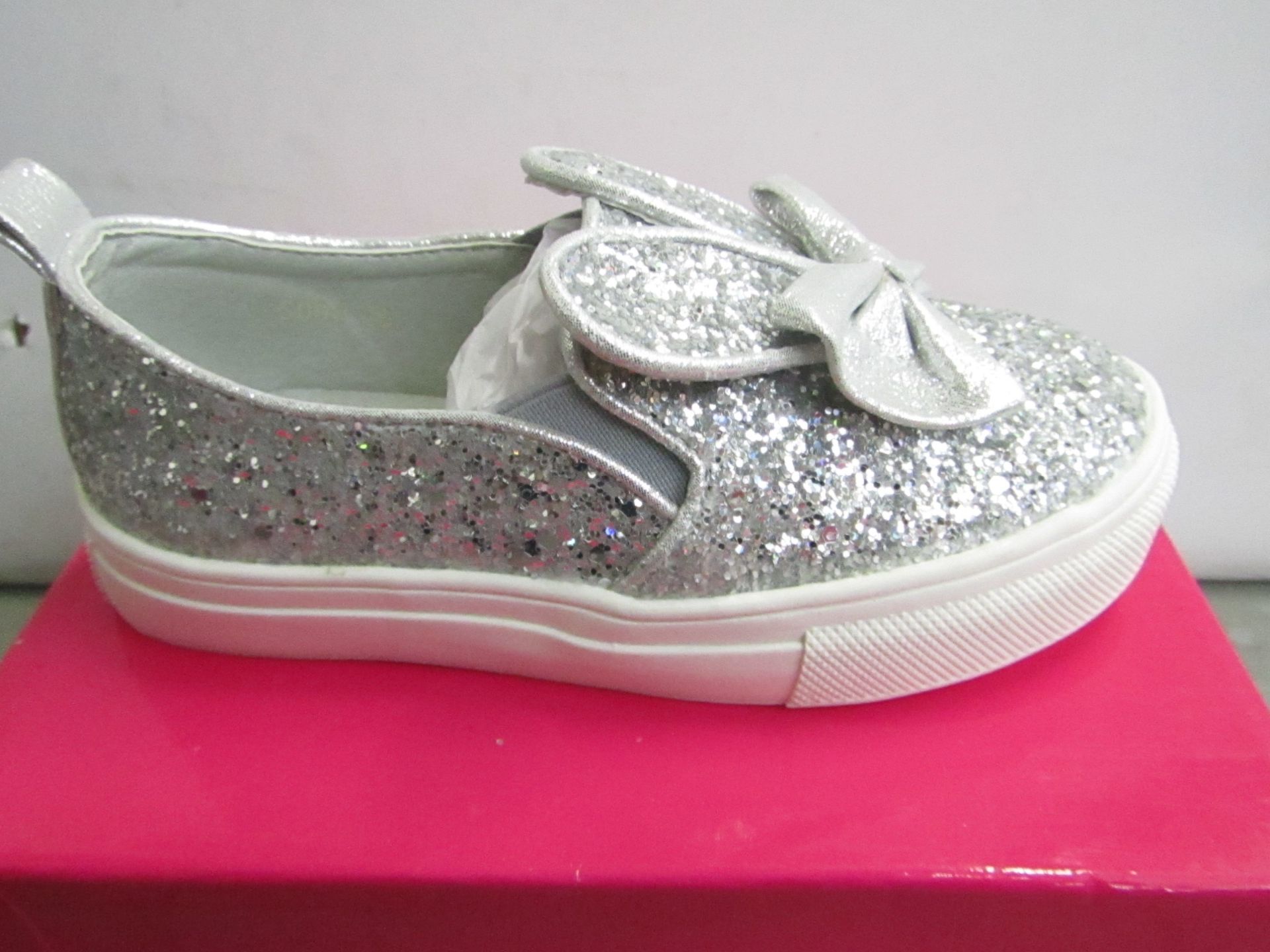 Miss Sophia Girls silver shoe with sequence  design on the main body of the shoe also bow on