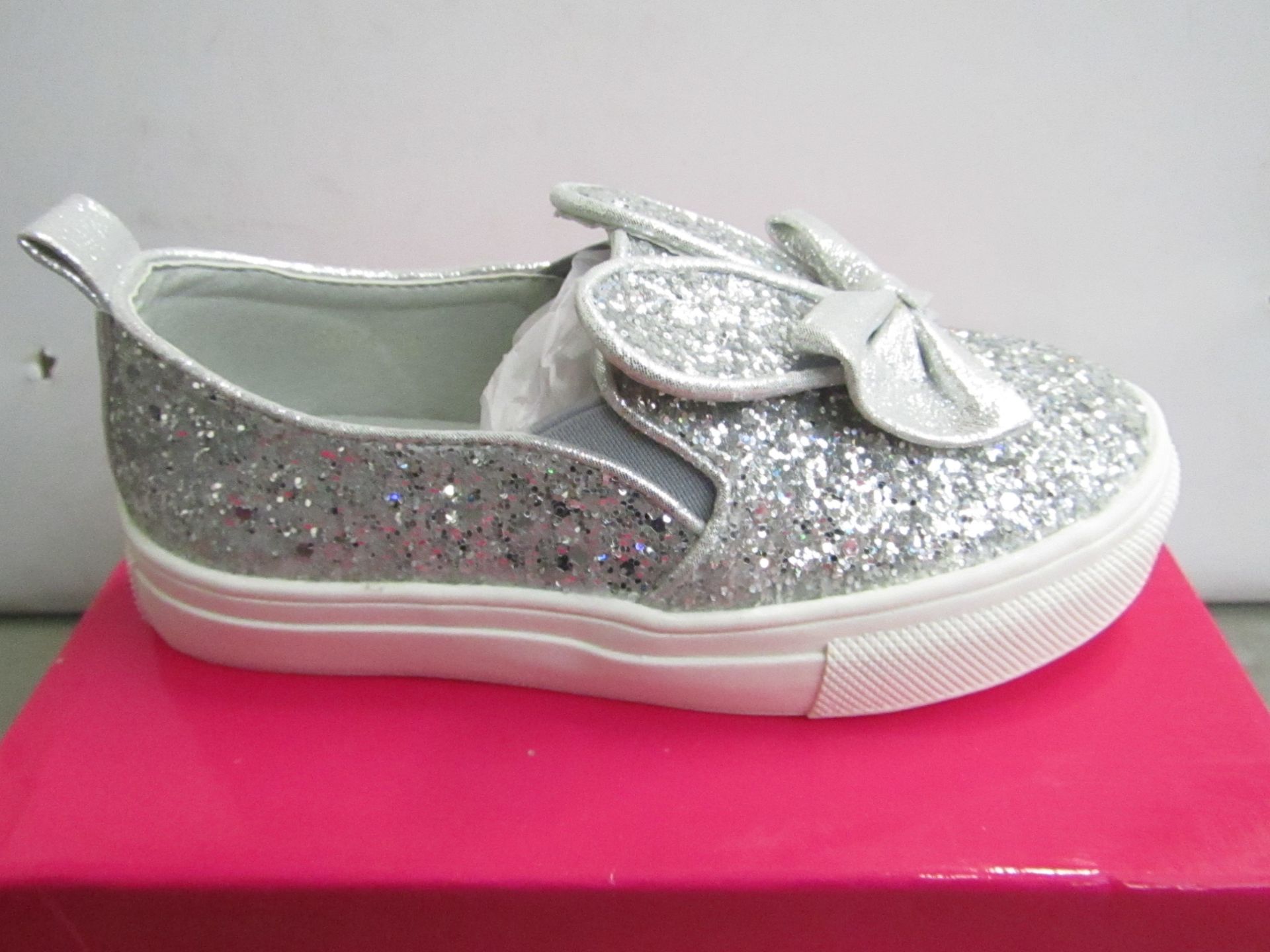 Miss Sophia Girls silver shoe with sequence  design on the main body of the shoe also bow on