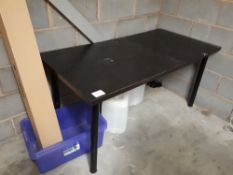 Wooden table with steel frame