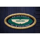 Aston Martin oval wall sign.