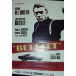 Set of four Steve McQueen posters.