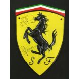 Ferrari metal shield.