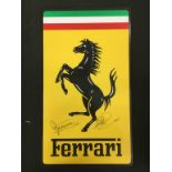 Ferrari metal garage sign.